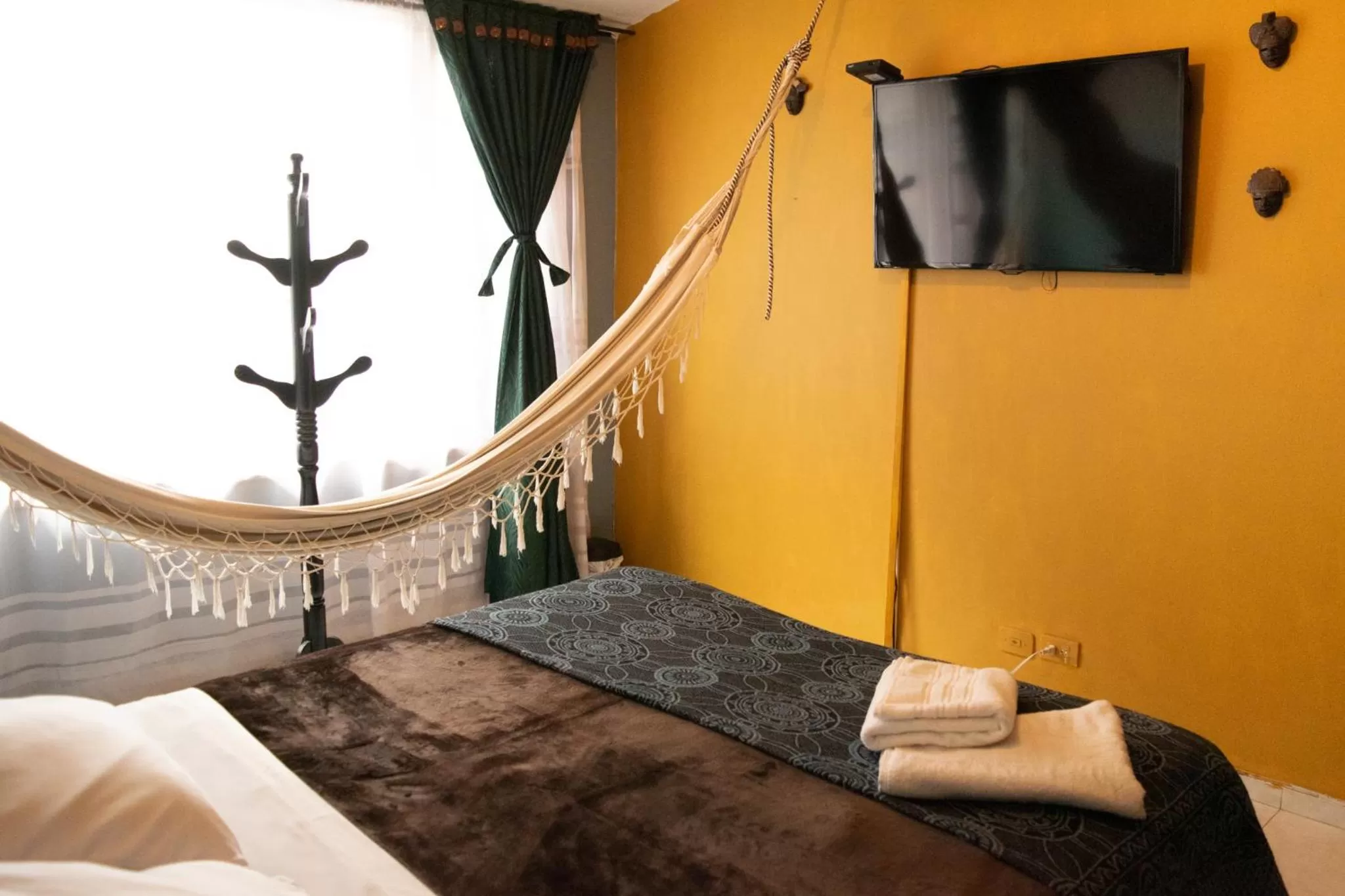 Bedroom, TV/Entertainment Center in Casa Mood Usaquen