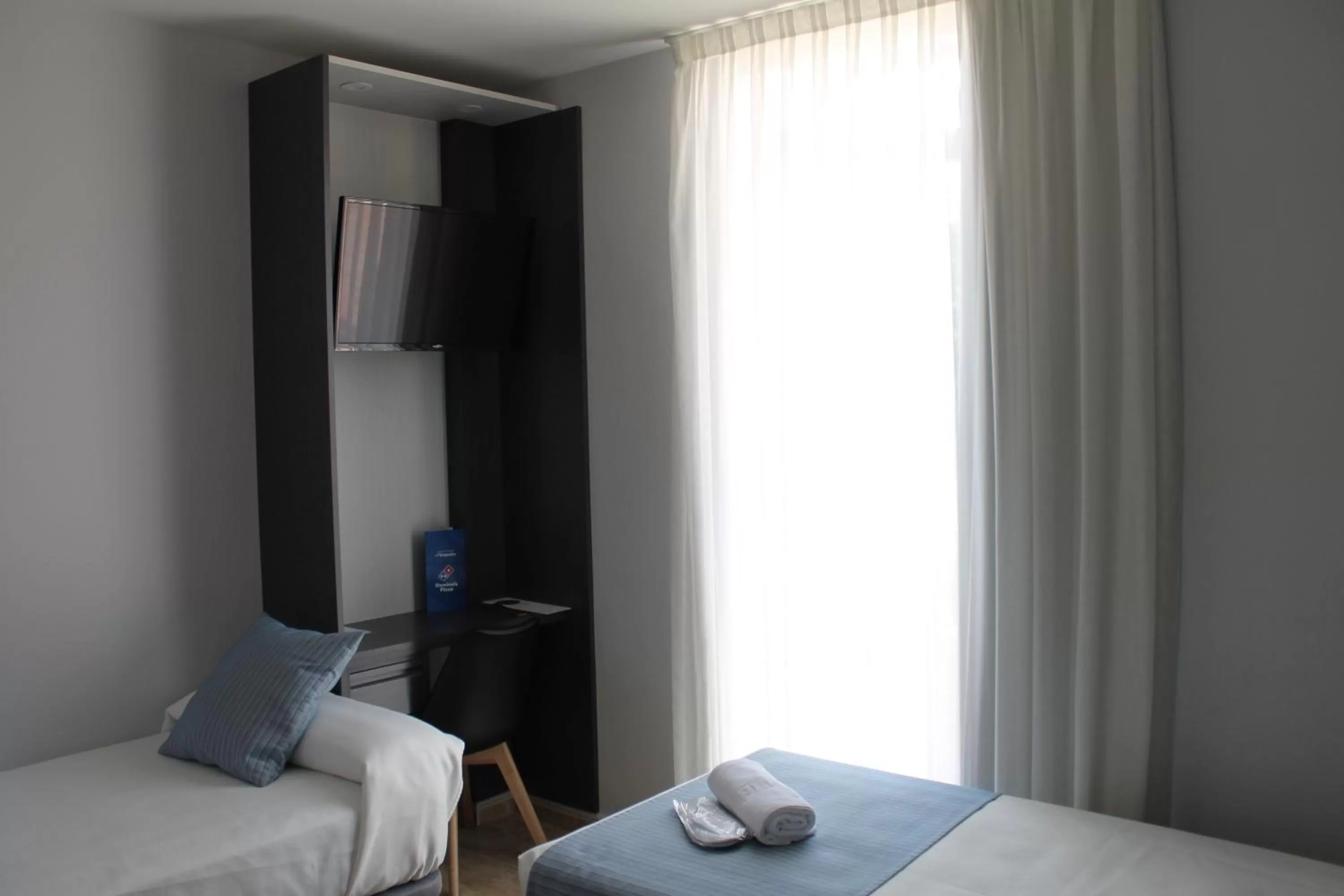 Photo of the whole room, Bed in Hotel Barajas Plaza