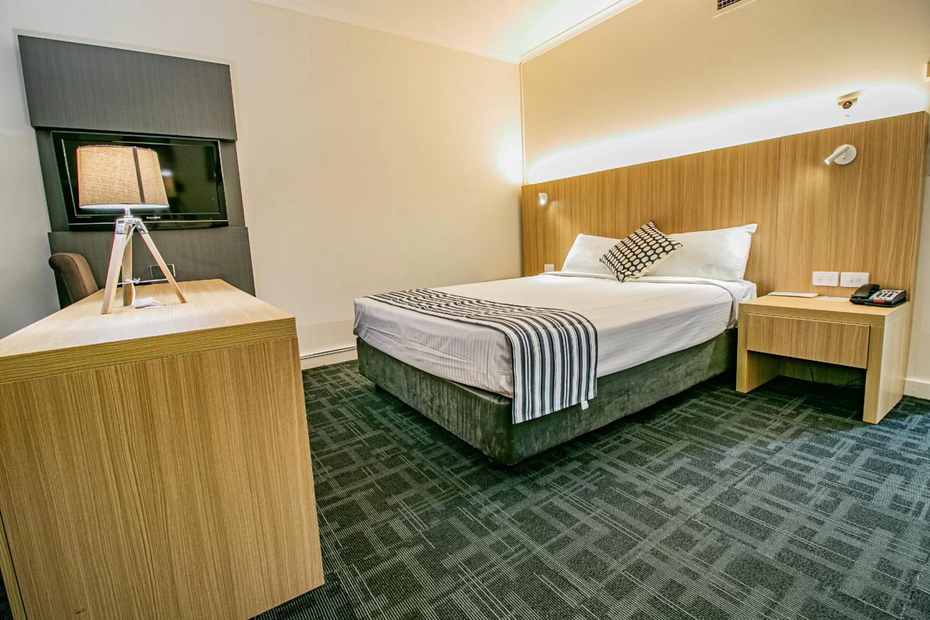 Bed in Absolute Beachfront Opal Cove Resort