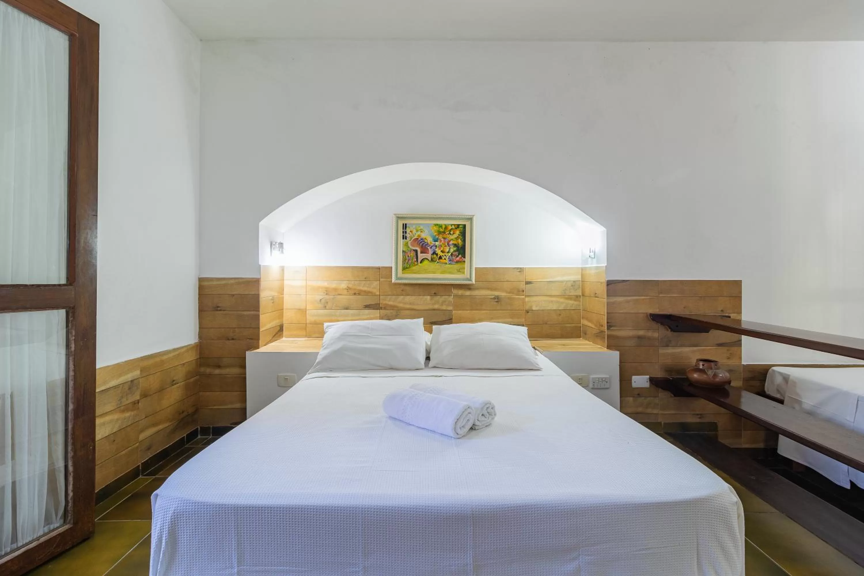 Bed in Pousada Casa Amarela