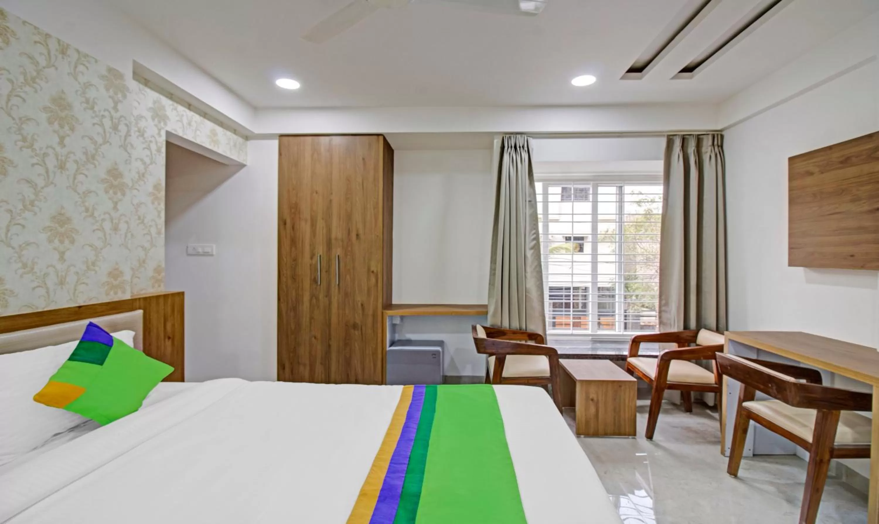 Bedroom, Bed in Treebo Chandraprasth Residency
