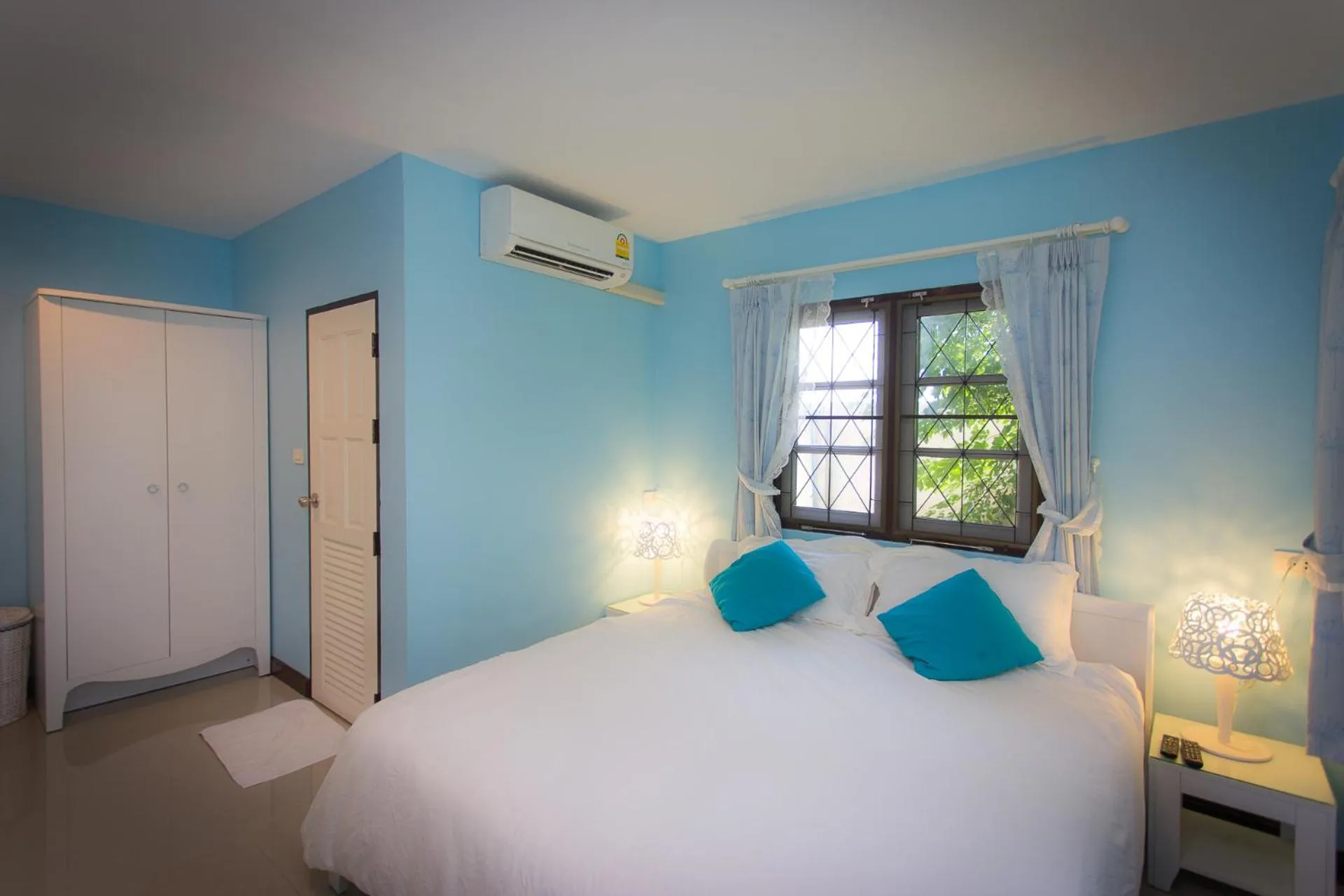 Bed in Thararin Villa