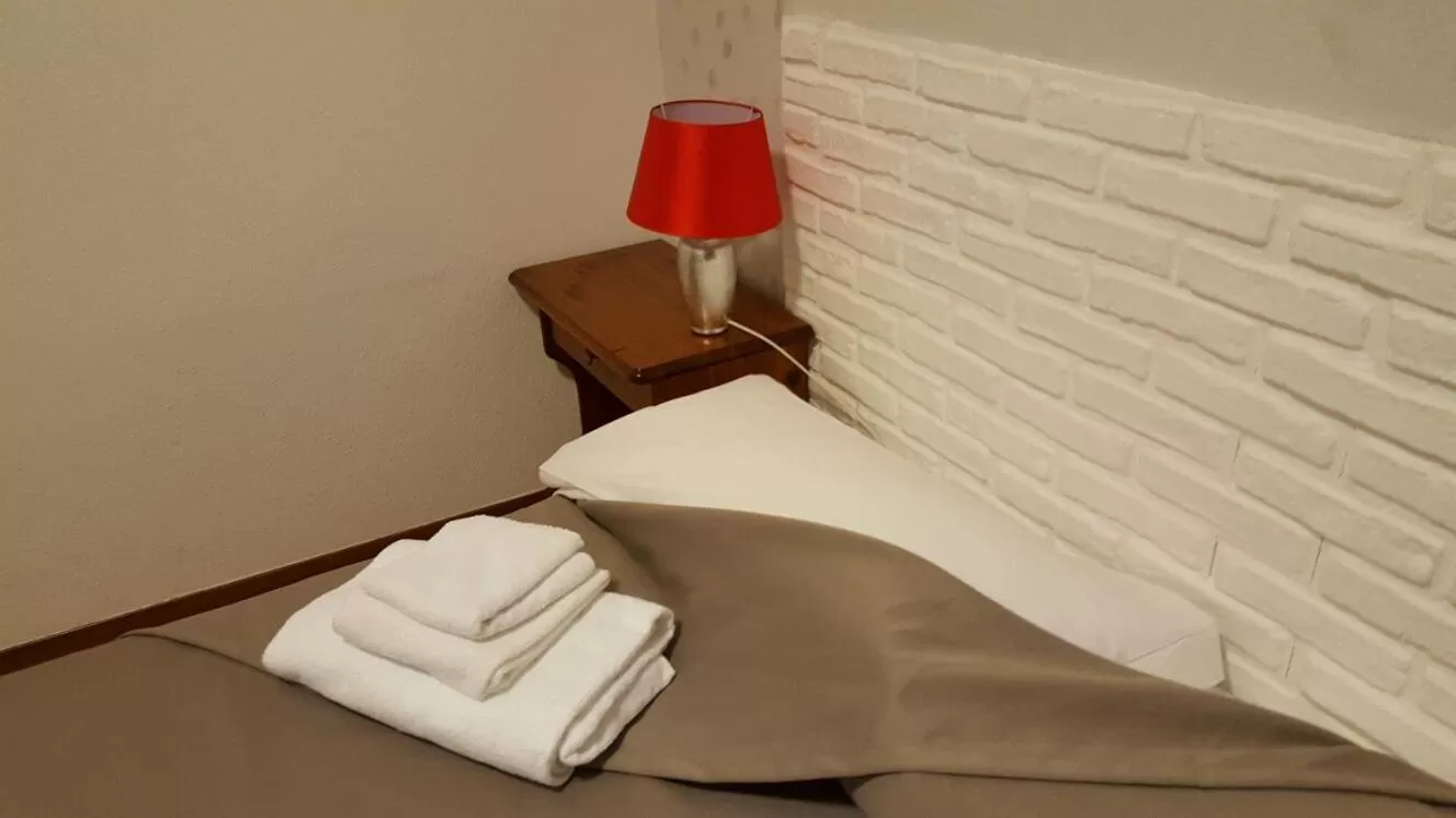 Bed in Hotel Calaluna