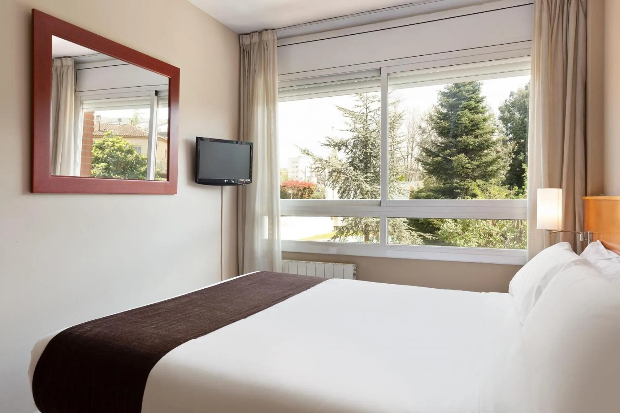 Bed in PARK SEDO Aparthotel