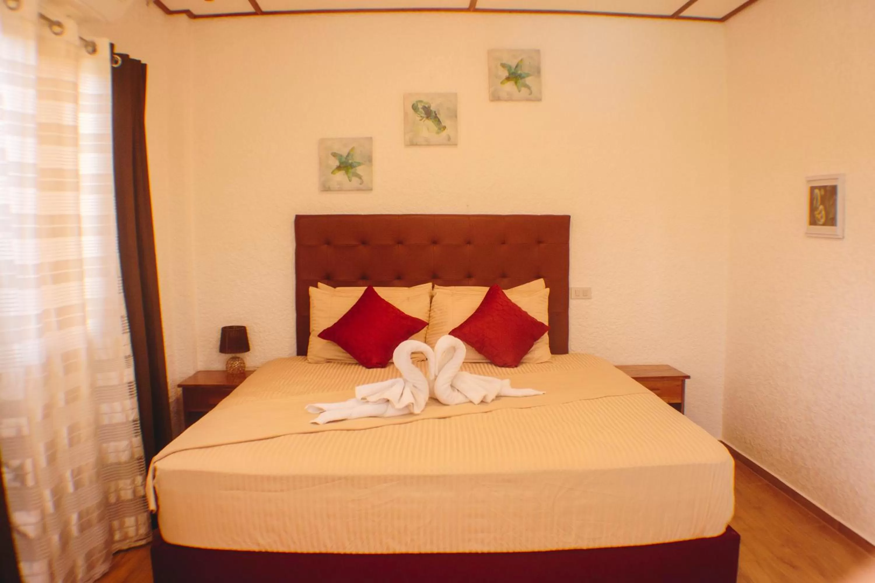 Bed in Jugalis Hotel and Restaurant