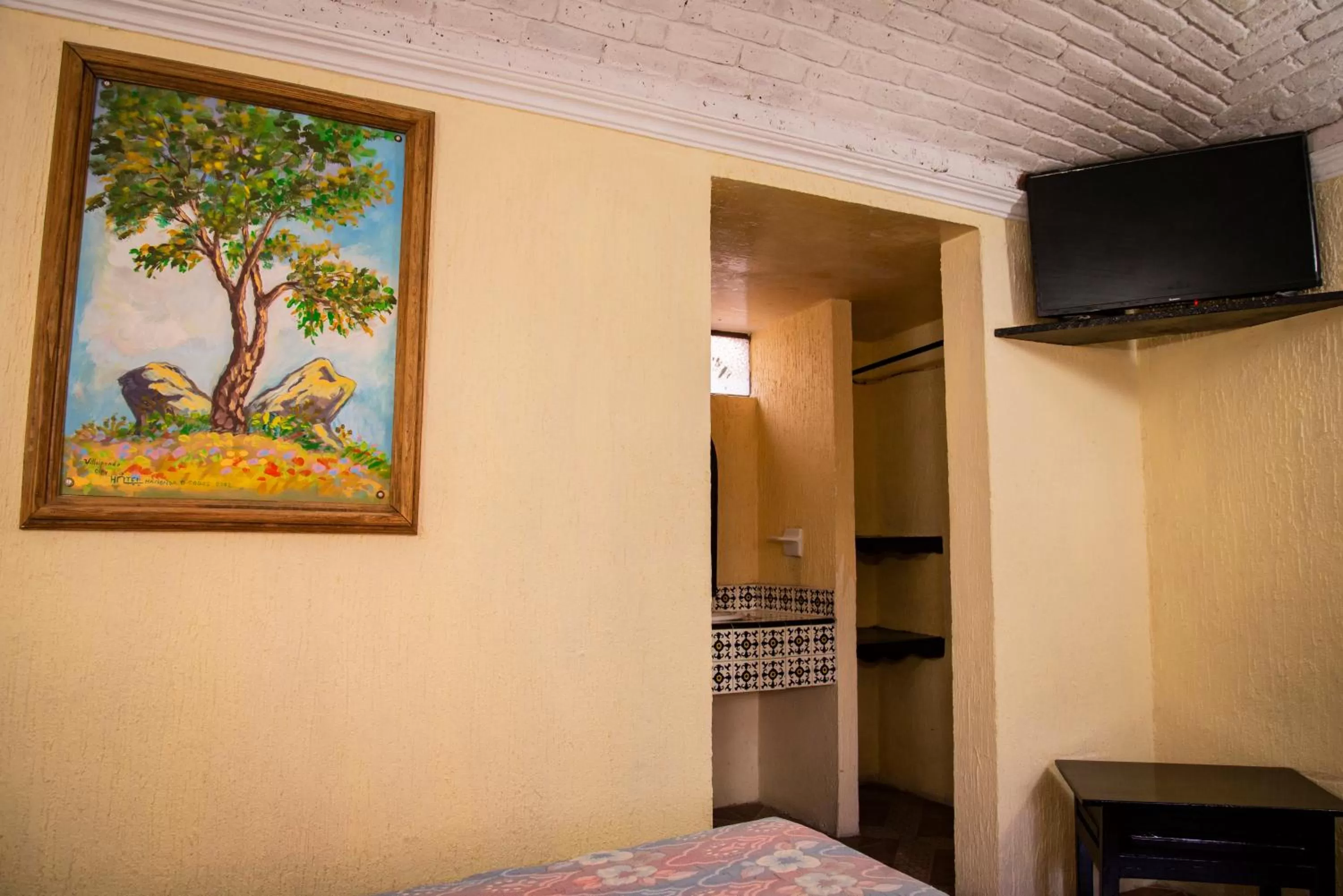 TV and multimedia, TV/Entertainment Center in Hotel Hacienda de Cobos