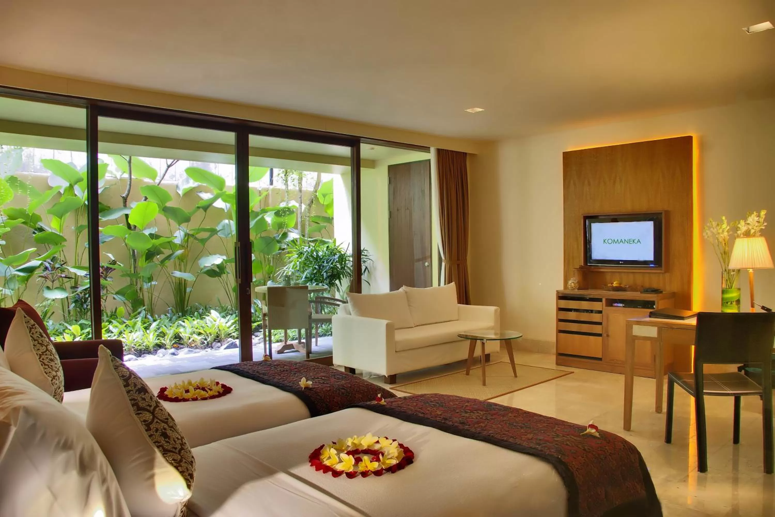 Bed in Komaneka at Rasa Sayang Ubud