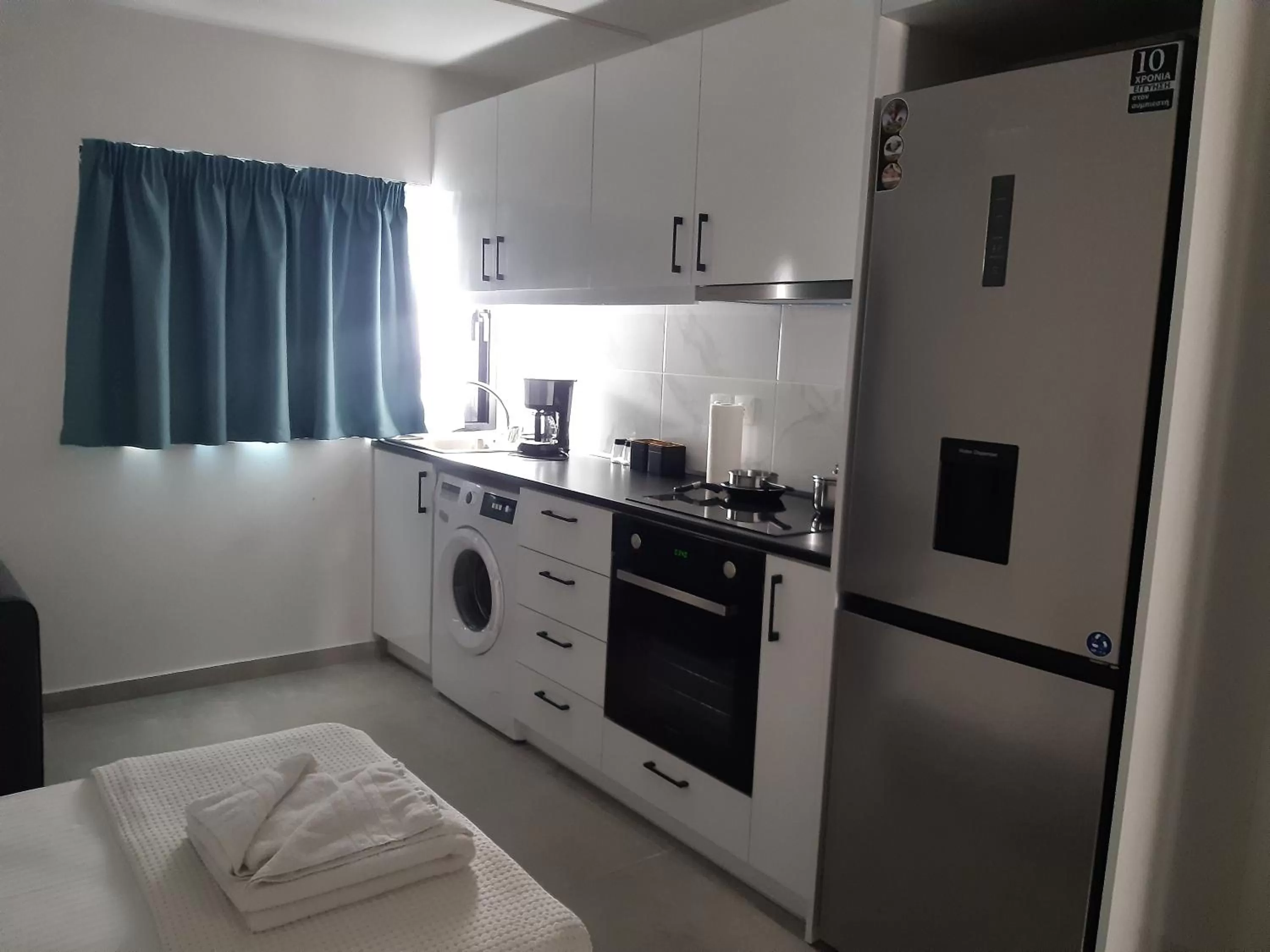 Kitchen or kitchenette, Bed in Evita's Luxury Apartments