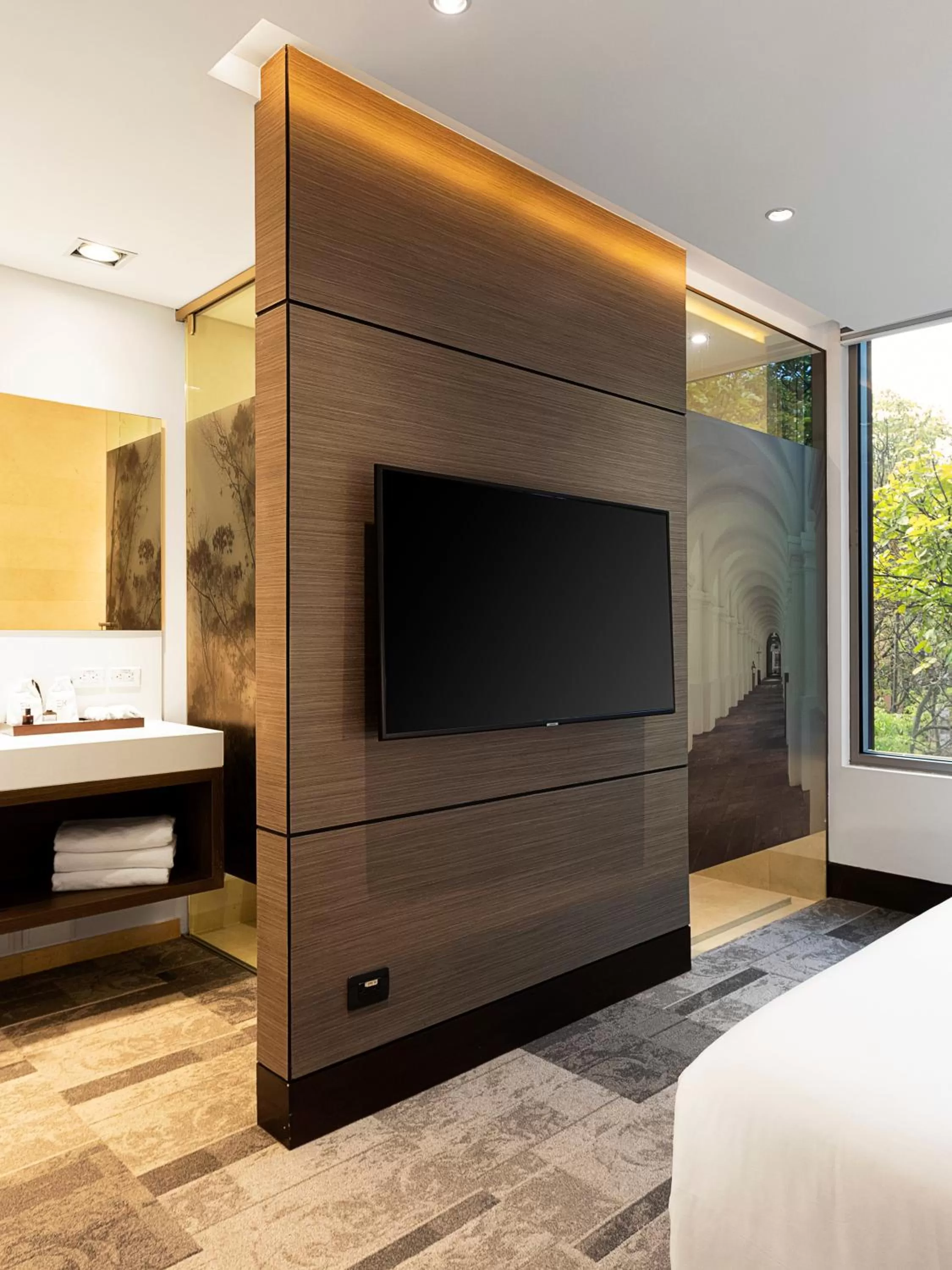 Communal lounge/ TV room, Bed in EK Hotel By Preferred Hotels Group
