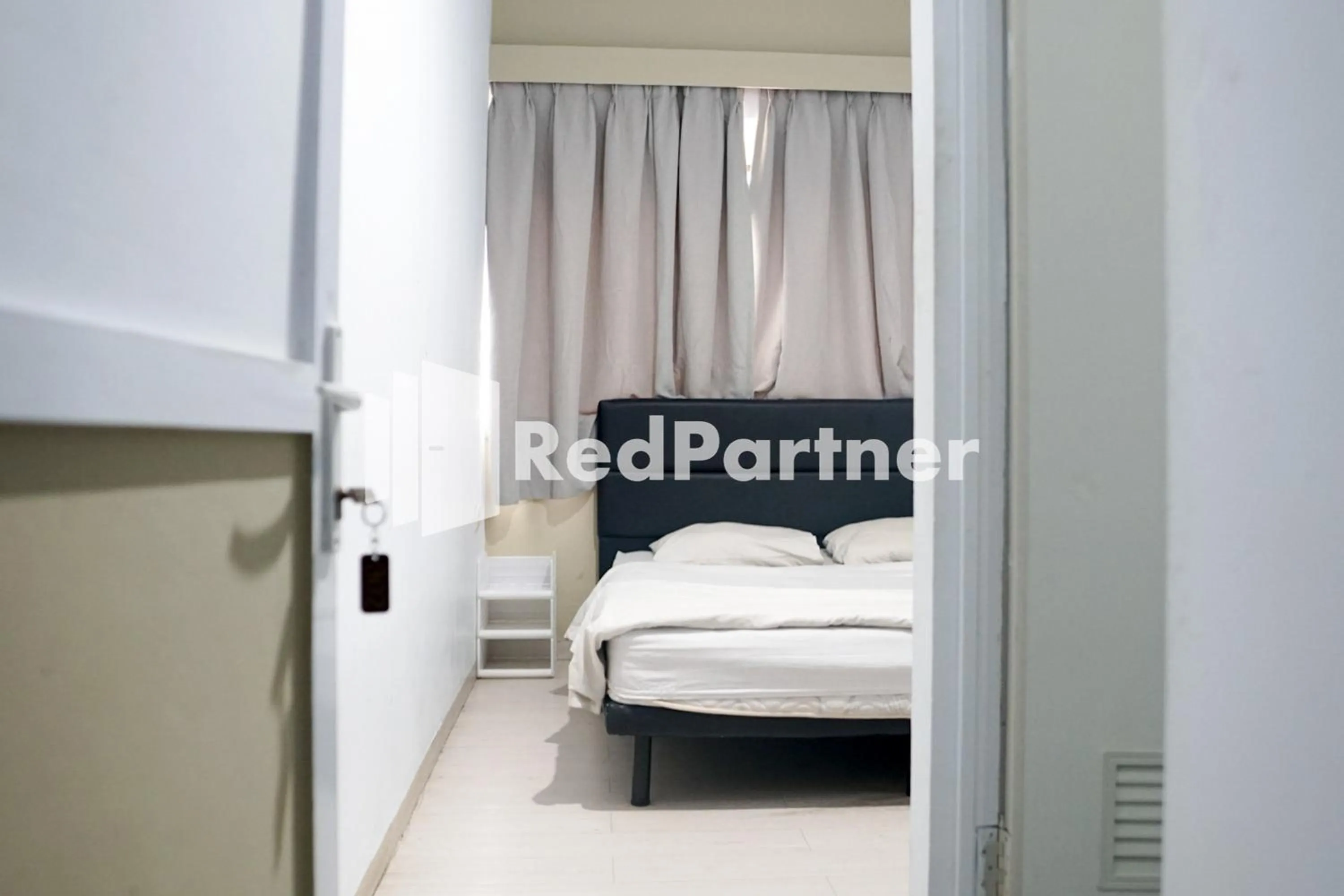 Bedroom in Cosmo Harmoni RedPartner