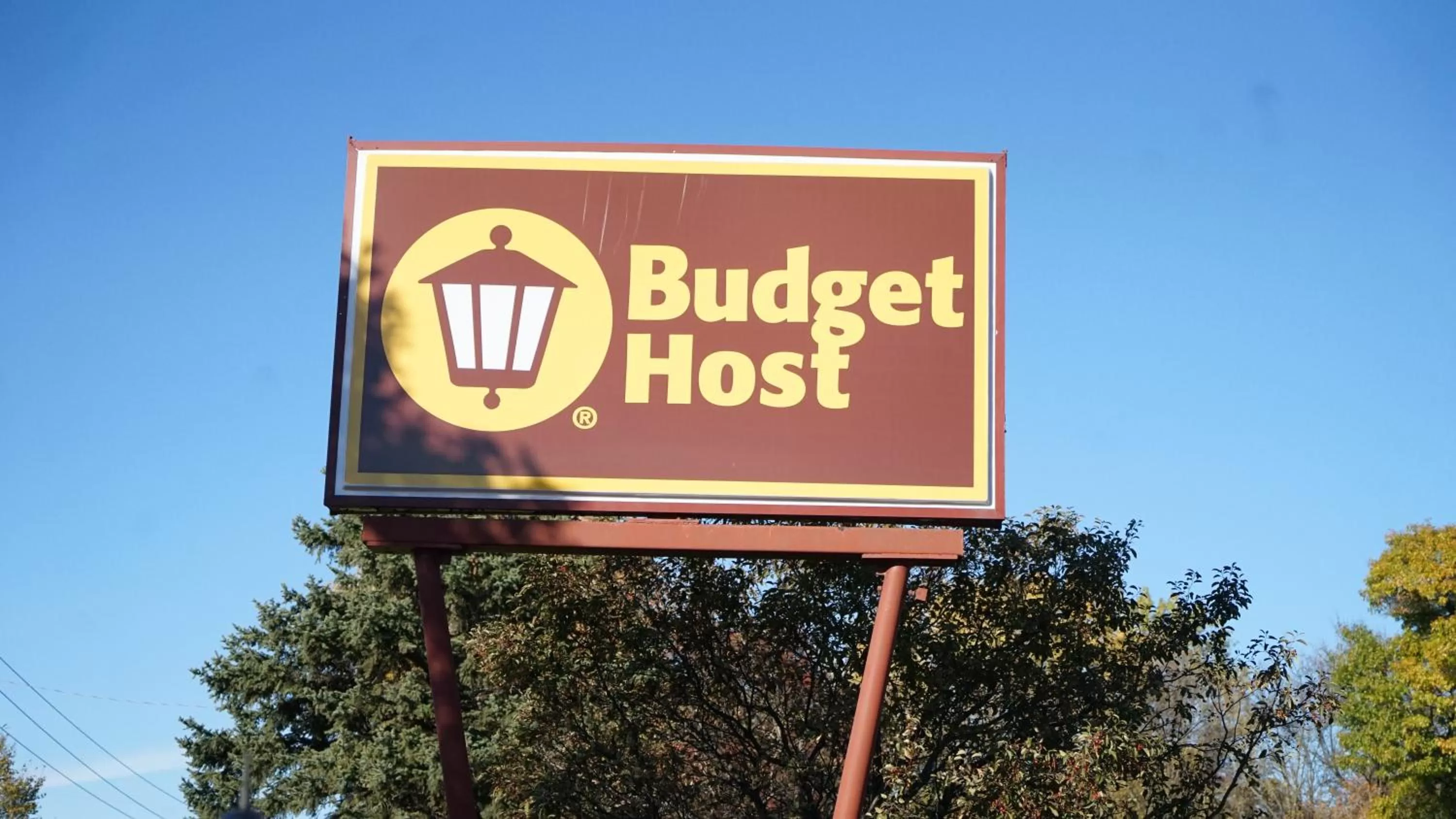 Property logo or sign in Budget Host Inn Fridley