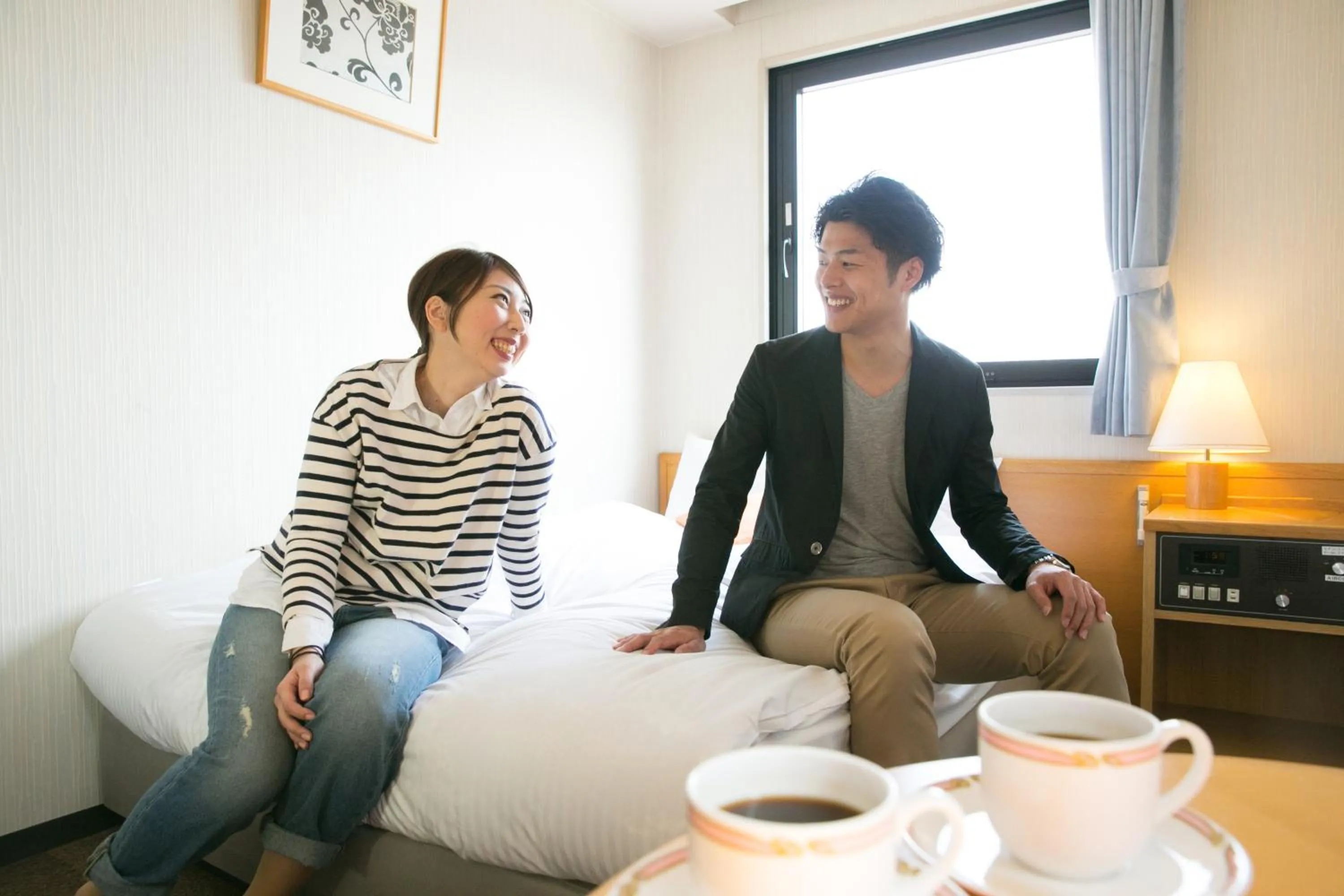 Bed in Heiwadai Hotel 5