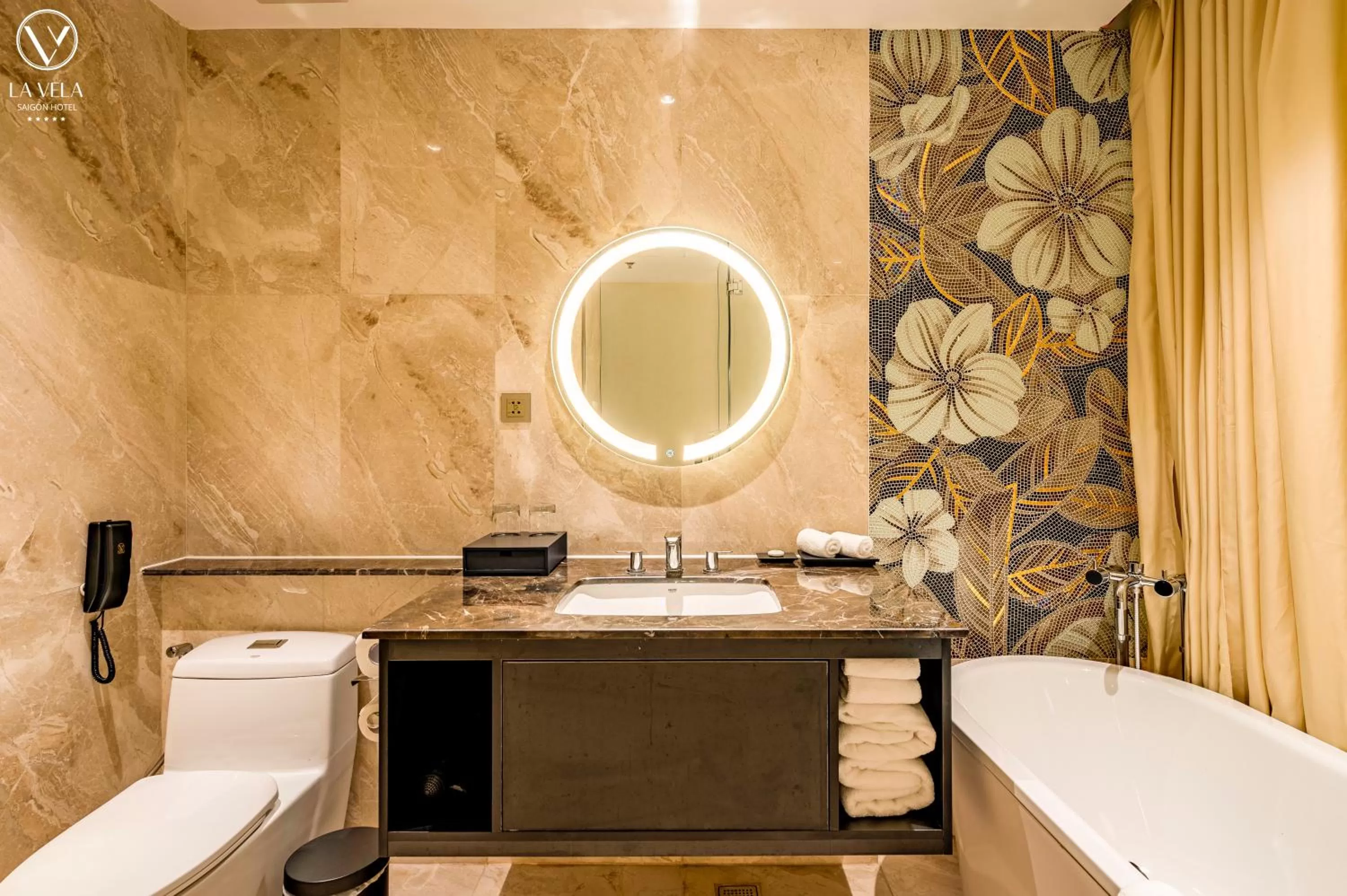 Bathroom in La Vela Saigon Hotel