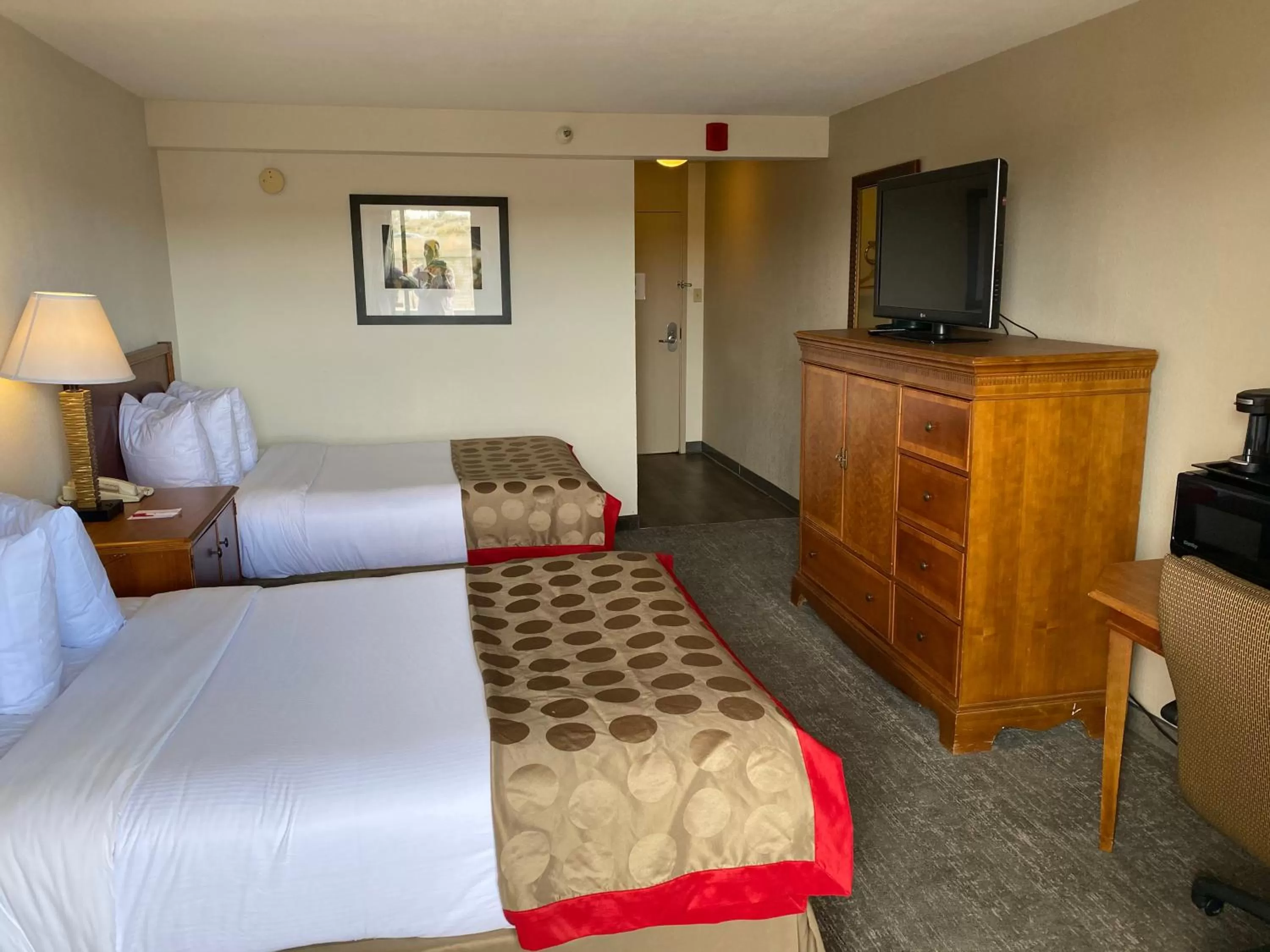 Bed in Ramada by Wyndham Albuquerque Midtown