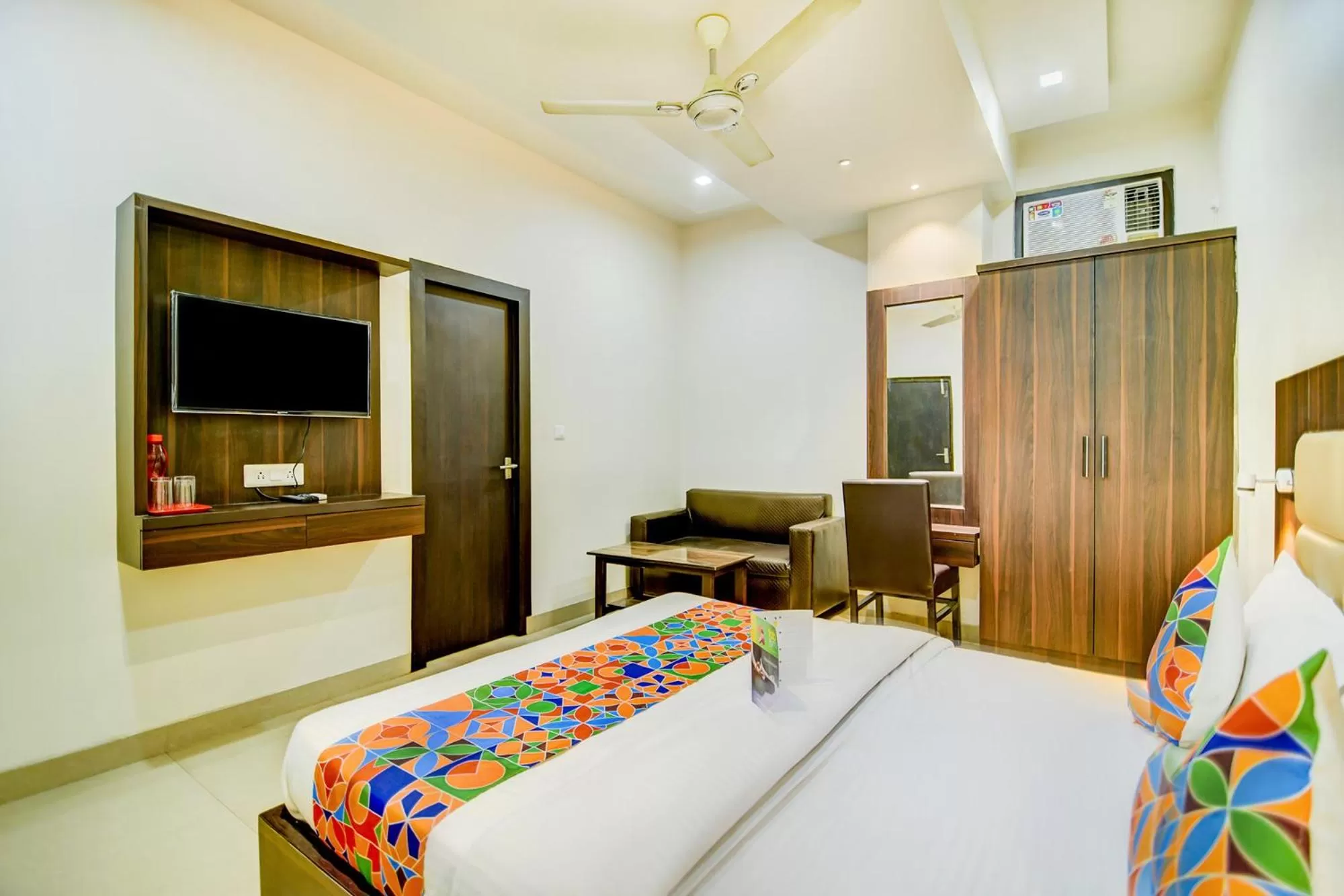 Bedroom, TV/Entertainment Center in FabHotel Solitaire Inn Tilak Nagar