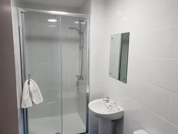 Shower in The Avenue Club and Lodge