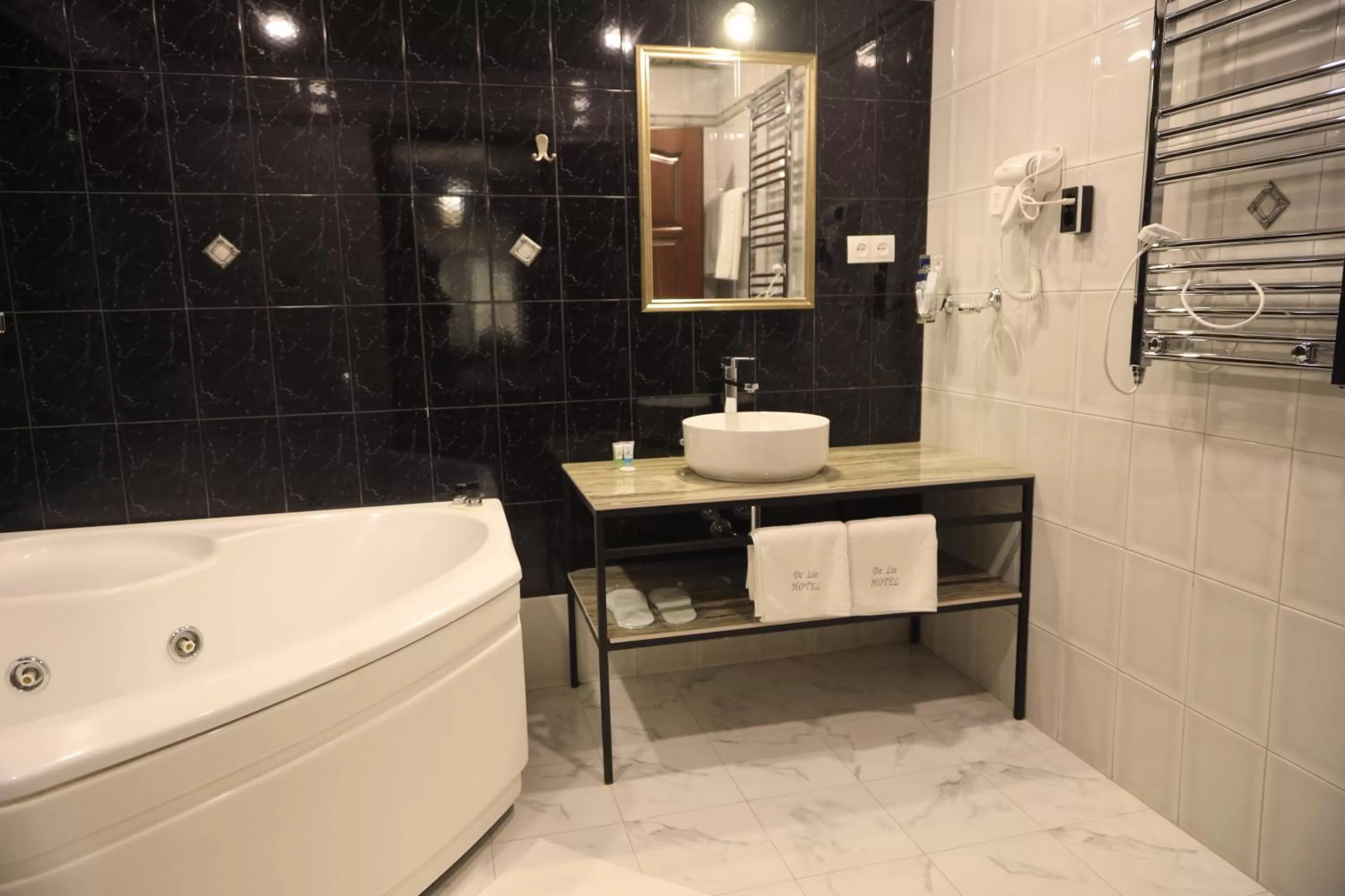 Bathroom in DeLin Hotel And Tours