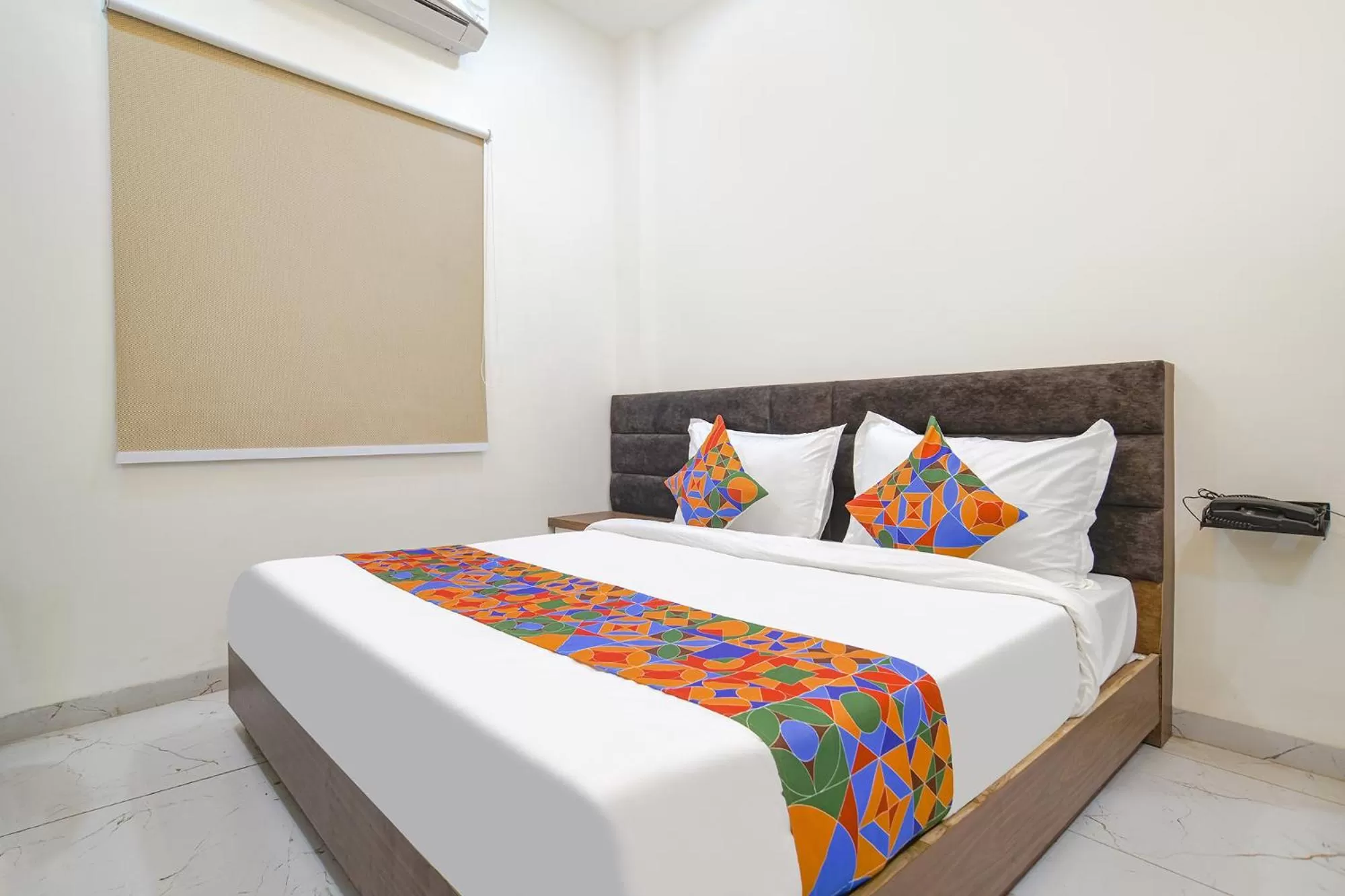 Bed in FabHotel Ramya