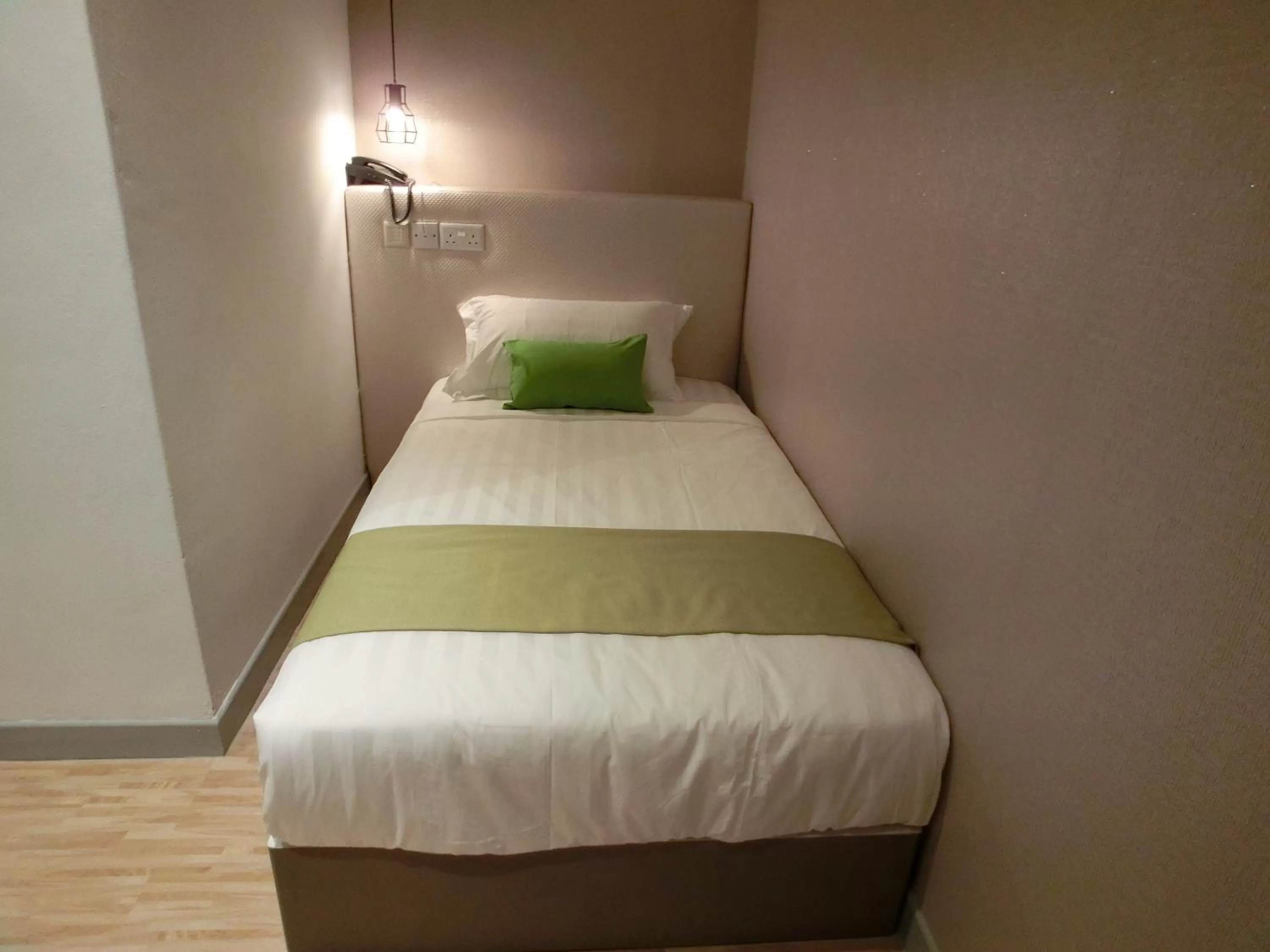 Bed in Champion Hotel