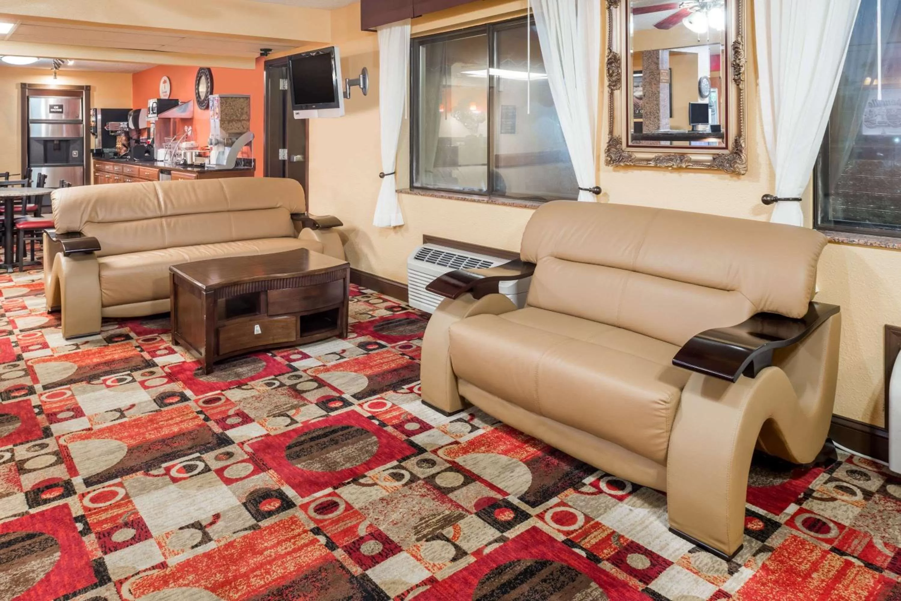 Seating area in Super 8 by Wyndham Jacksonville