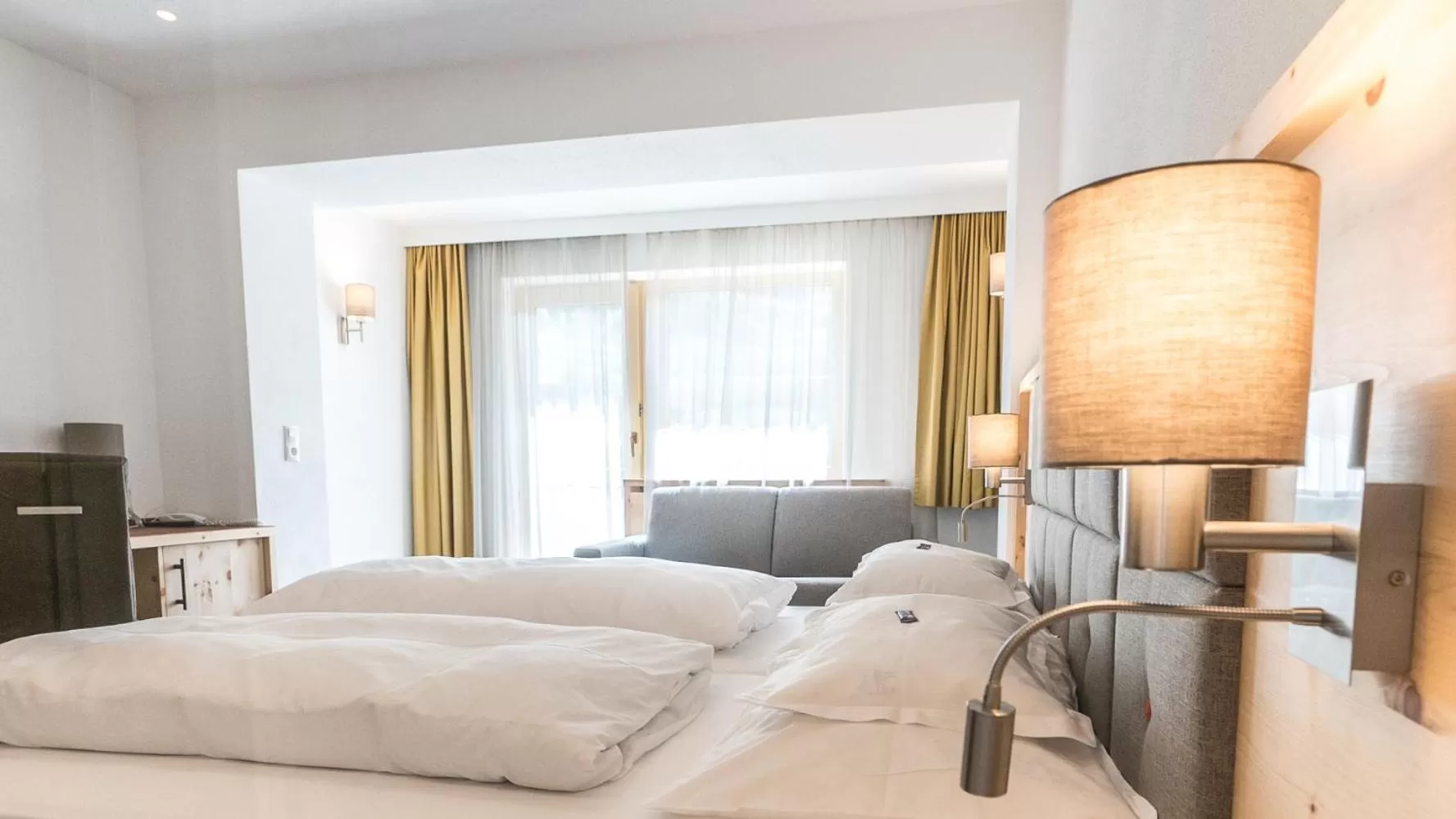 Photo of the whole room, Bed in Wellnesshotel Mein Almhof Superior