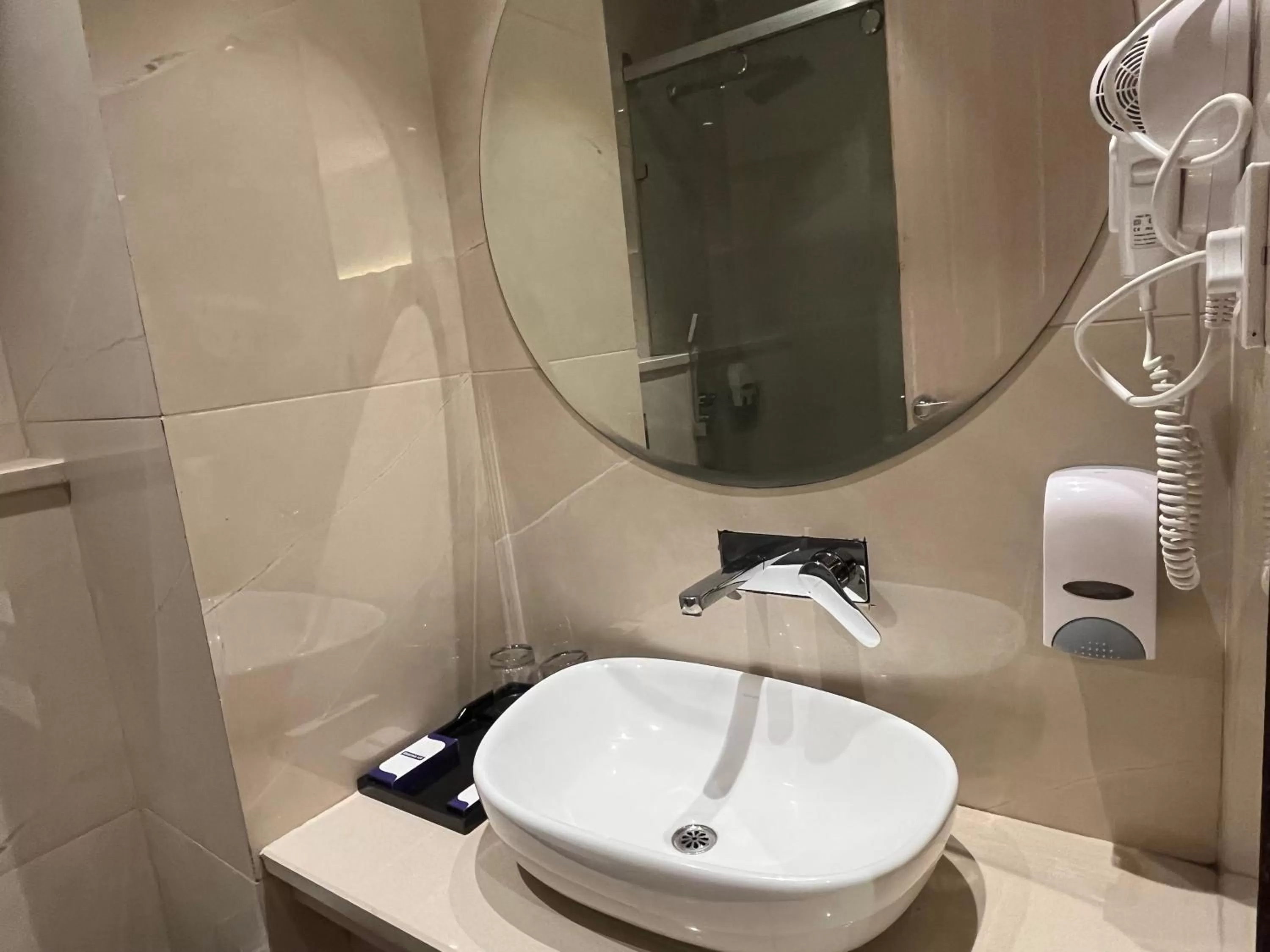 Bathroom in RRV Hotel