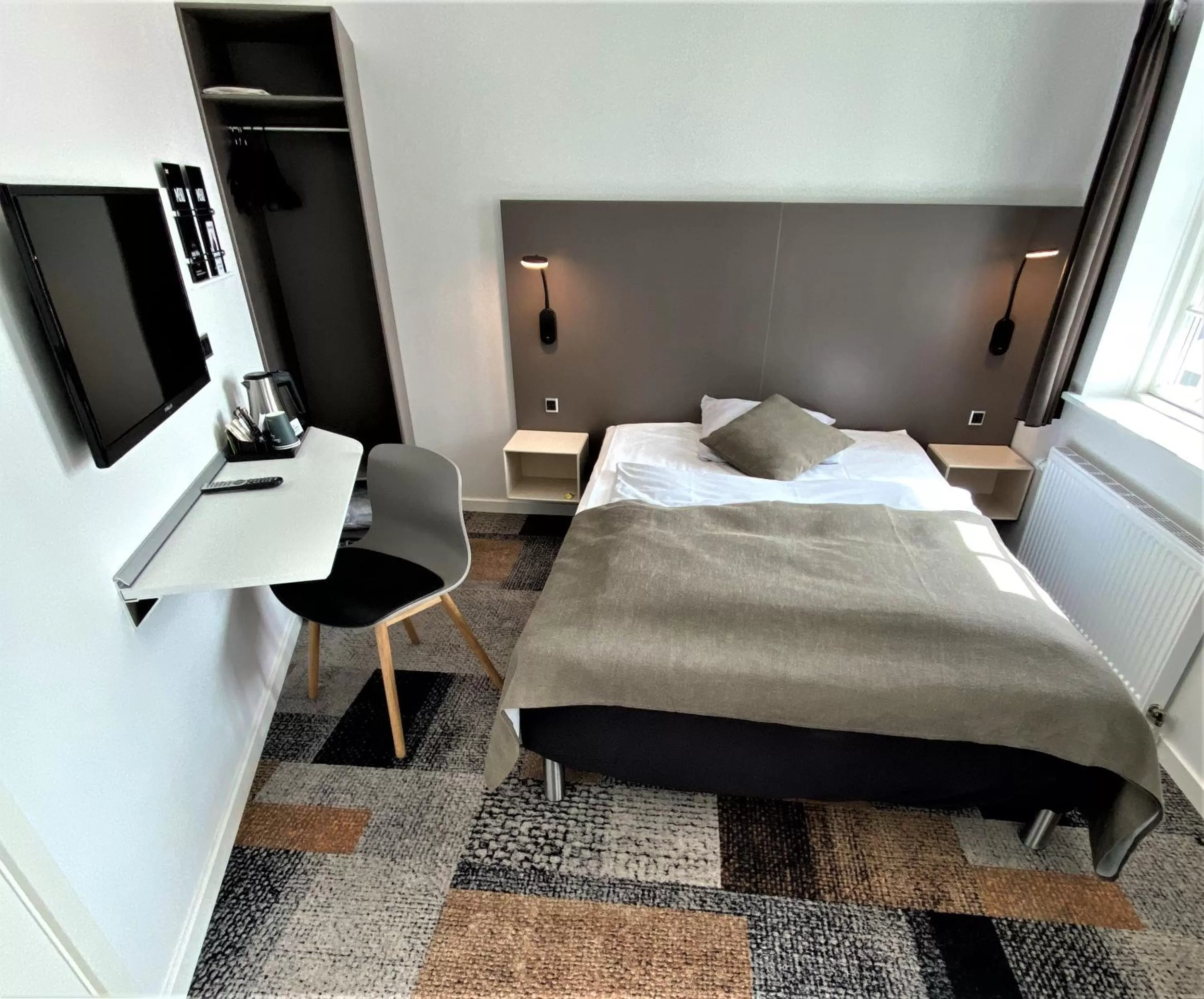 Bed in Hotel Skivehus