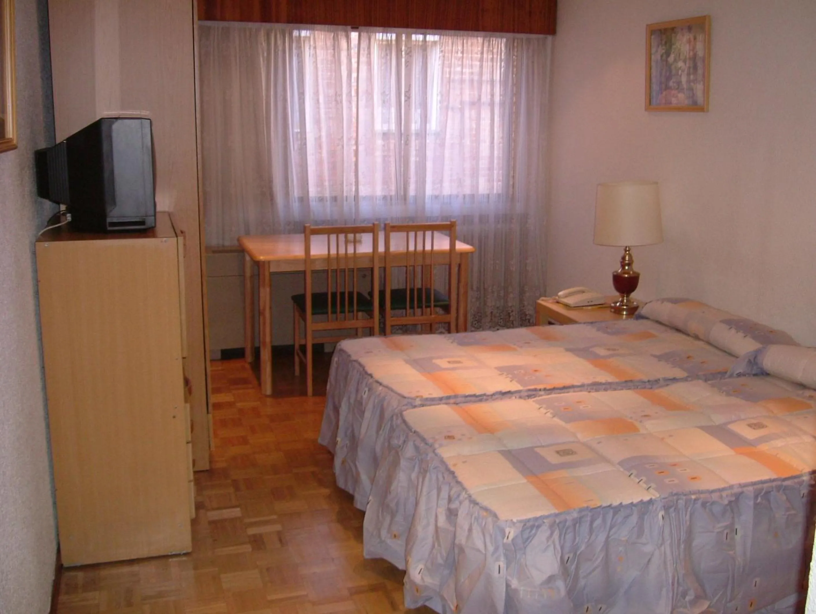 Bed in Apartamentos Goya 75