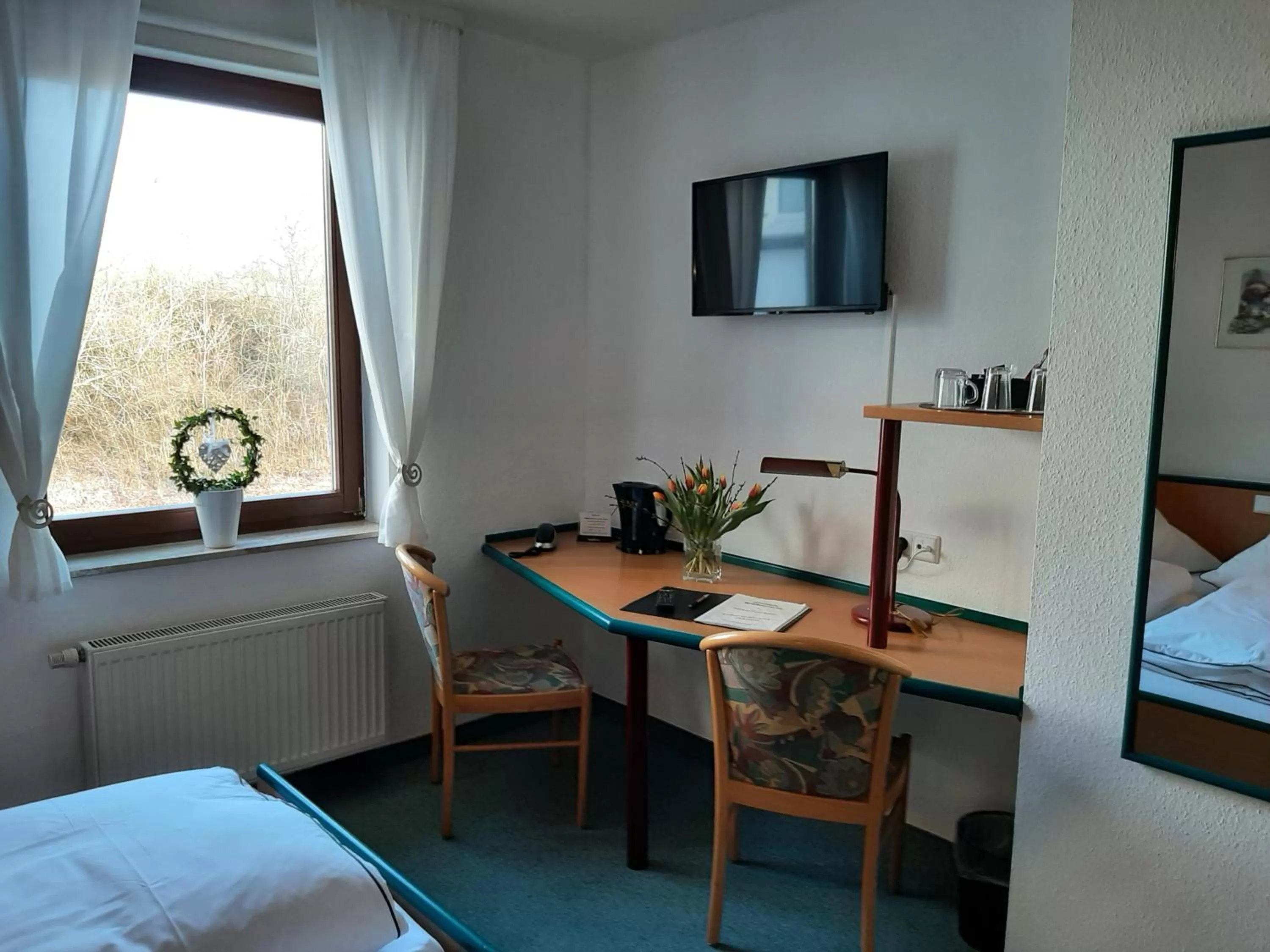 TV and multimedia, TV/Entertainment Center in Hotel & Restaurant Eichholz