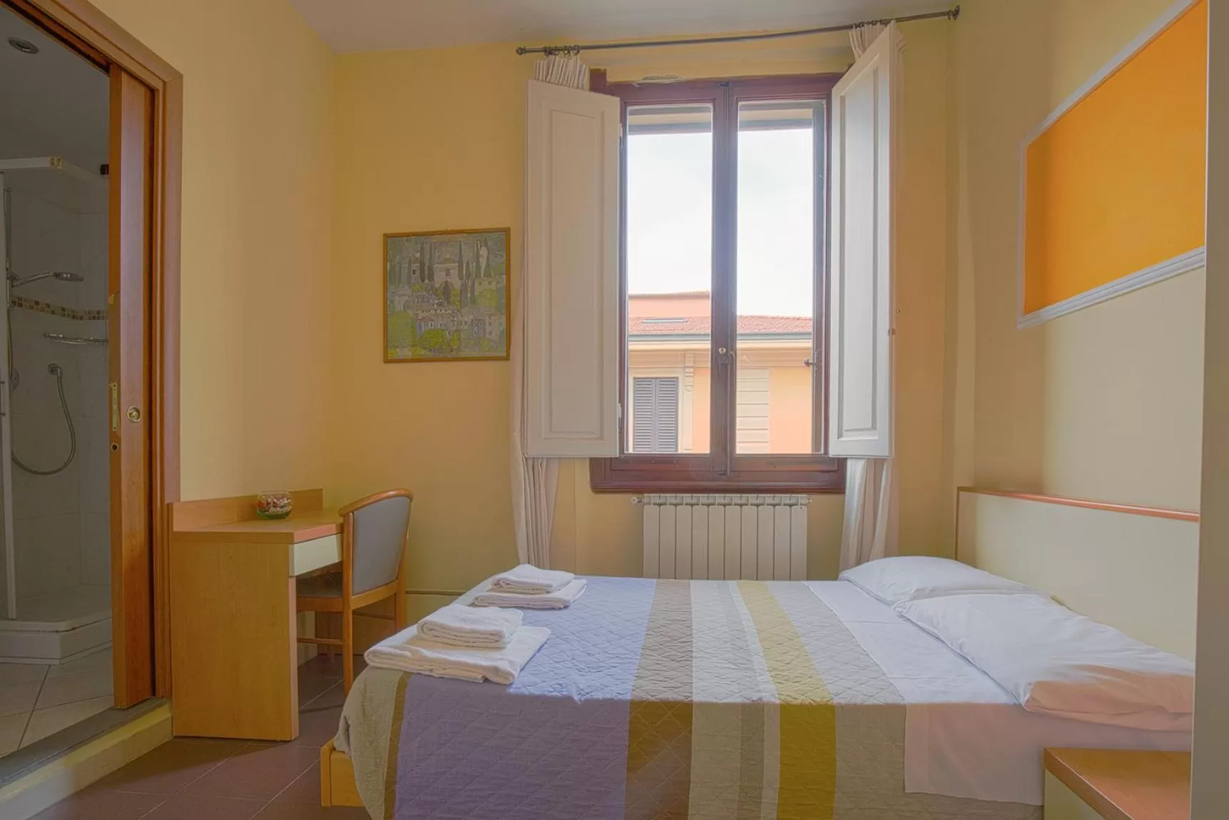 Bed in Hotel Angelica Firenze