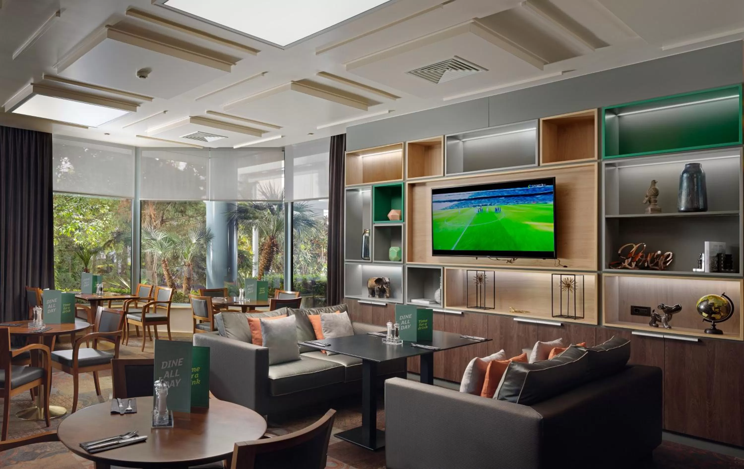 Lounge or bar in Holiday Inn Athens Attica Av, Airport W. by IHG