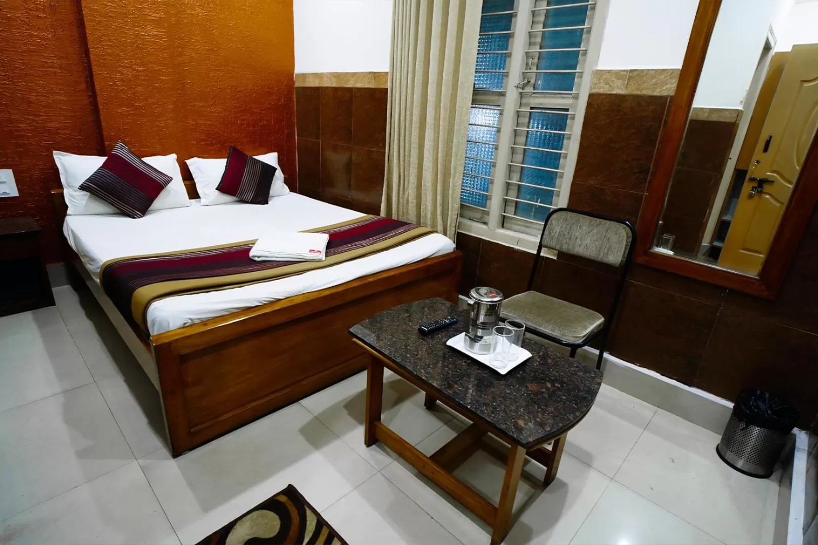 Bed in HOTEL PRAKAASH RESIDENCY
