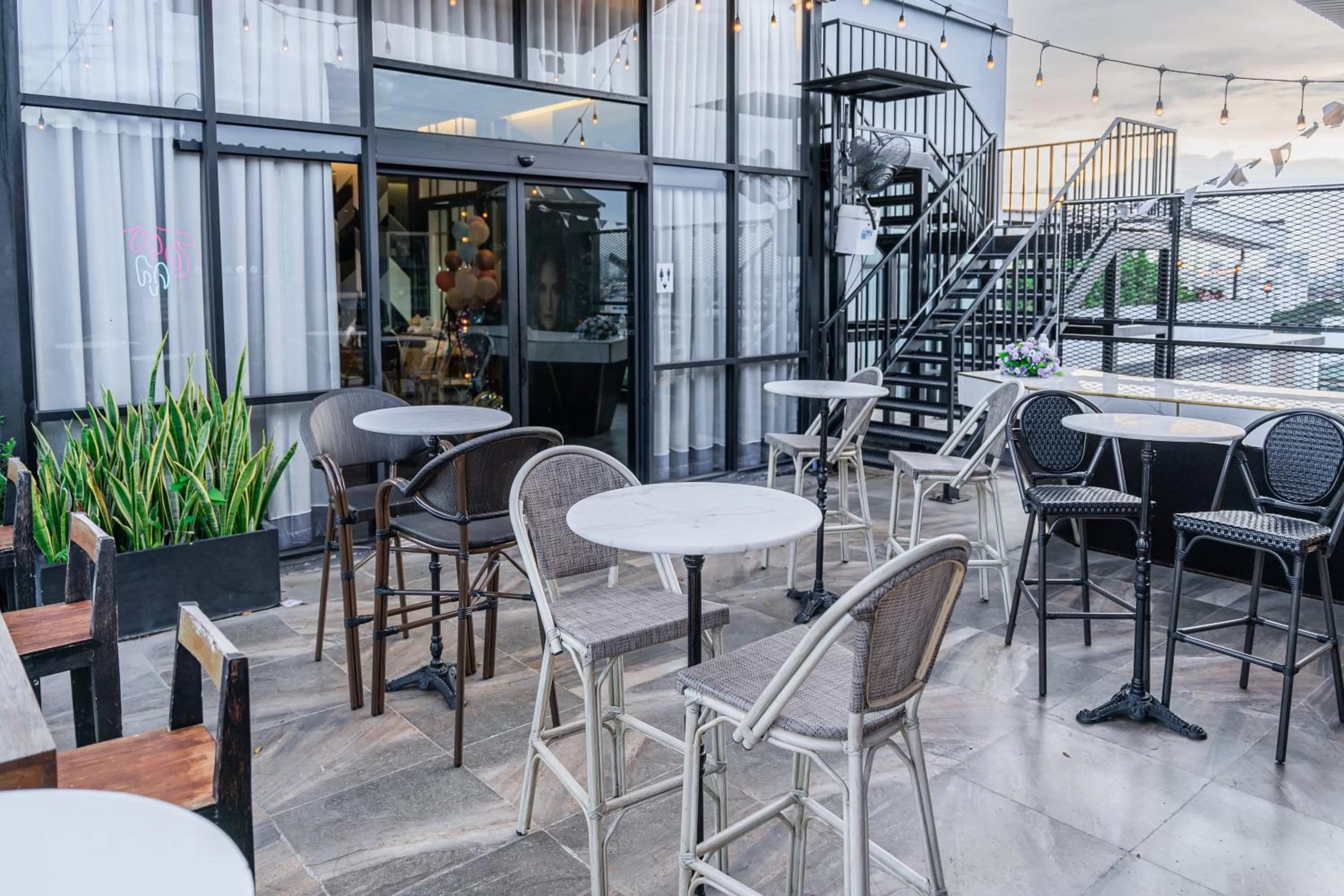 Dining area in The Riche Boutique Hotel Don Mueang Airport