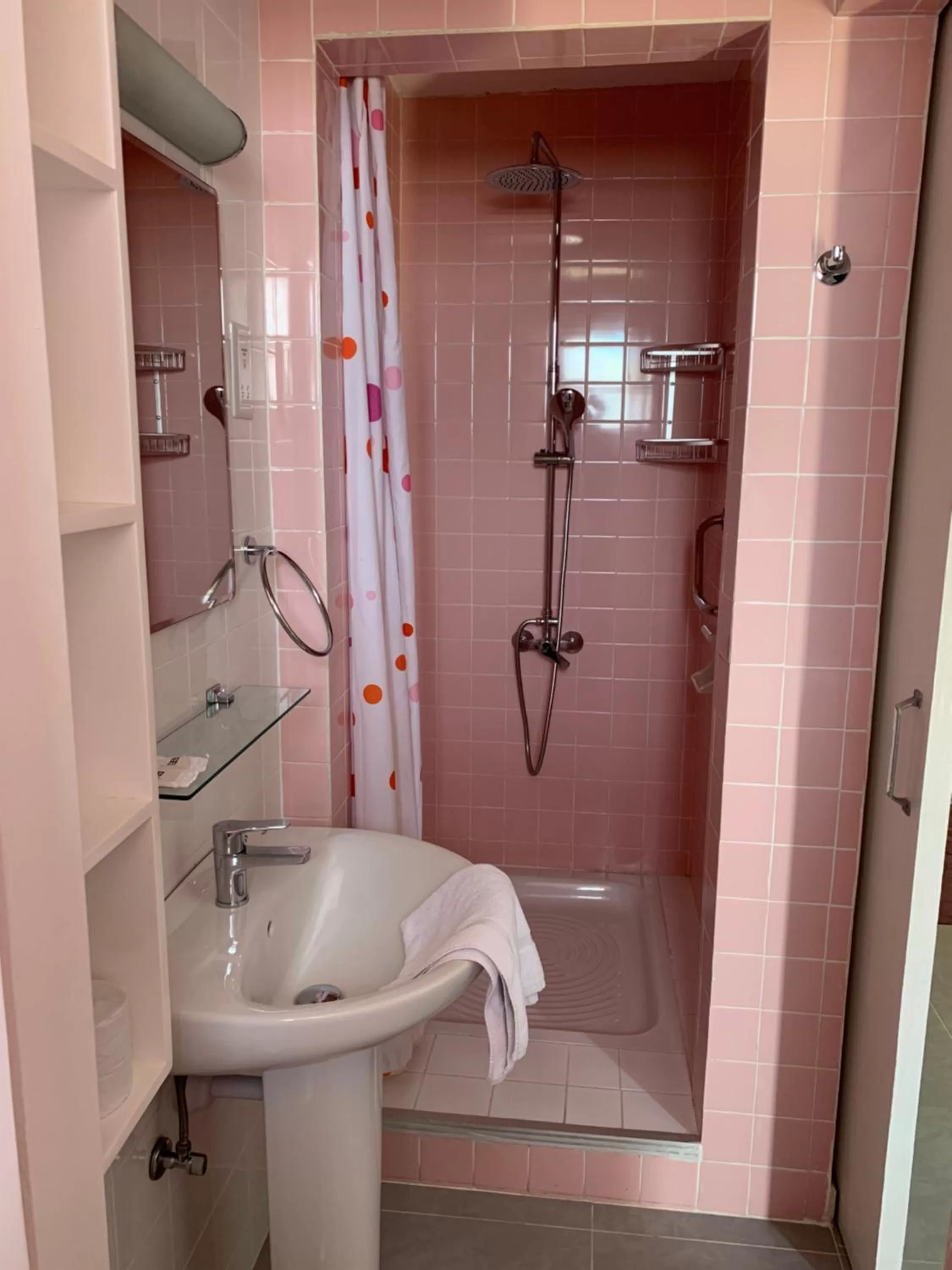 Shower in Axiothea Hotel