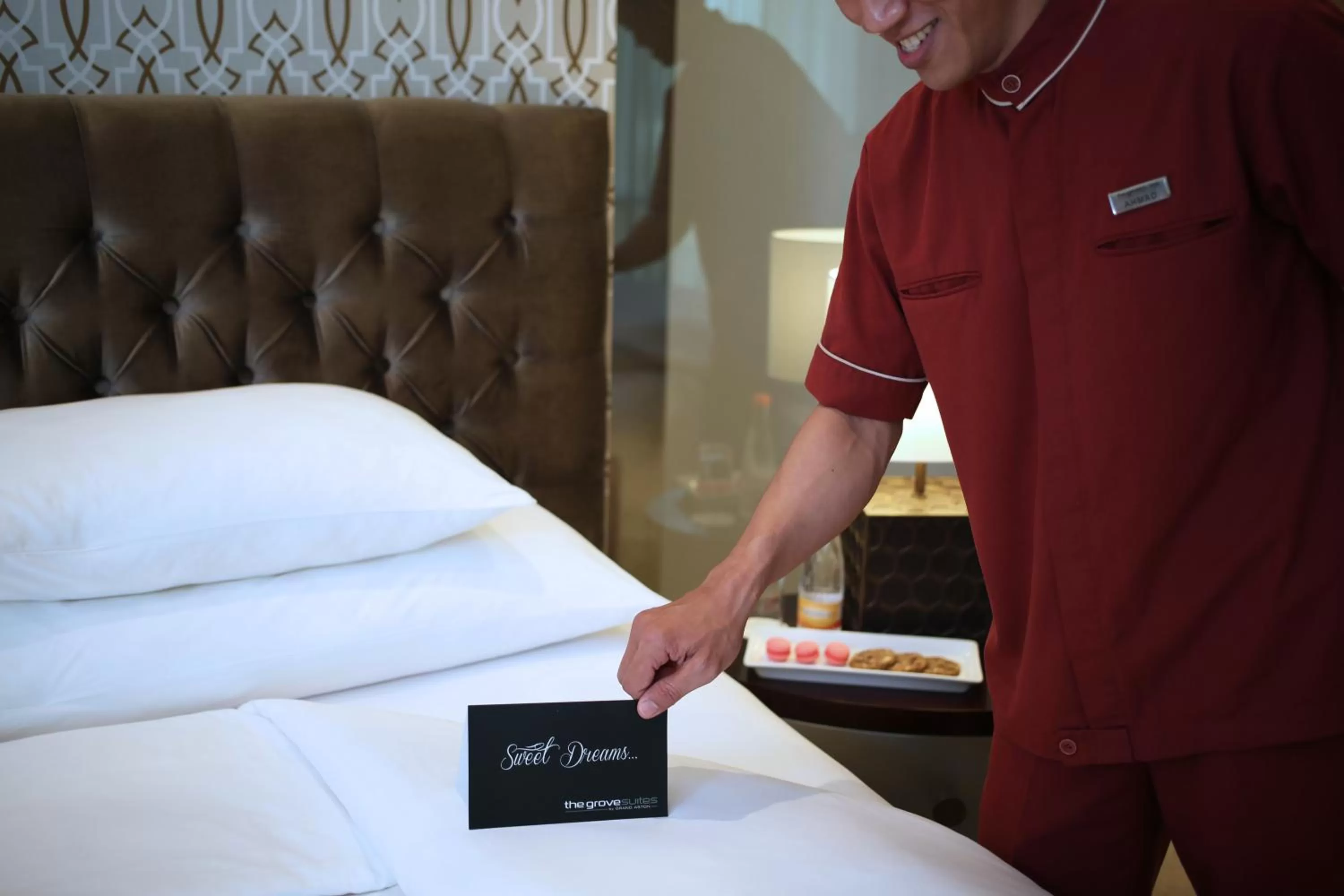 Decorative detail, Bed in The Grove Suites by Grand Aston