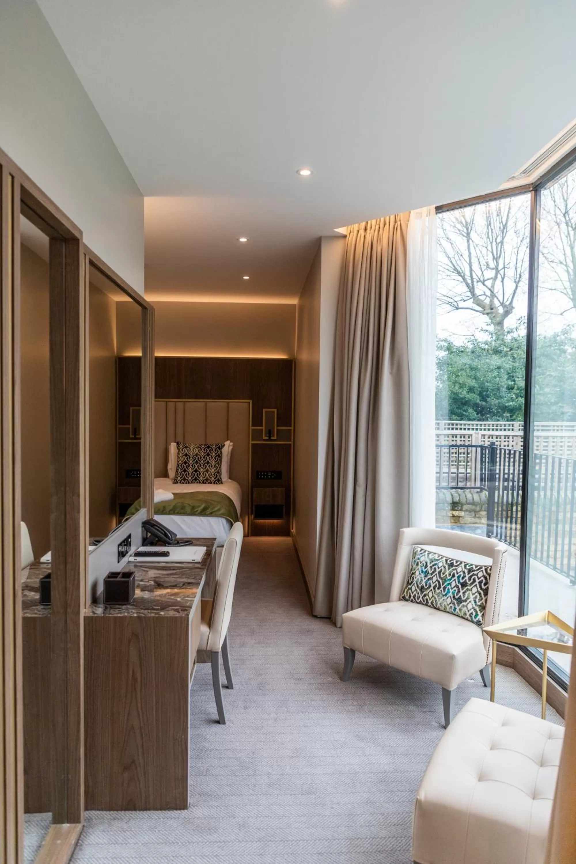 Bed in Merit Kensington Hotel