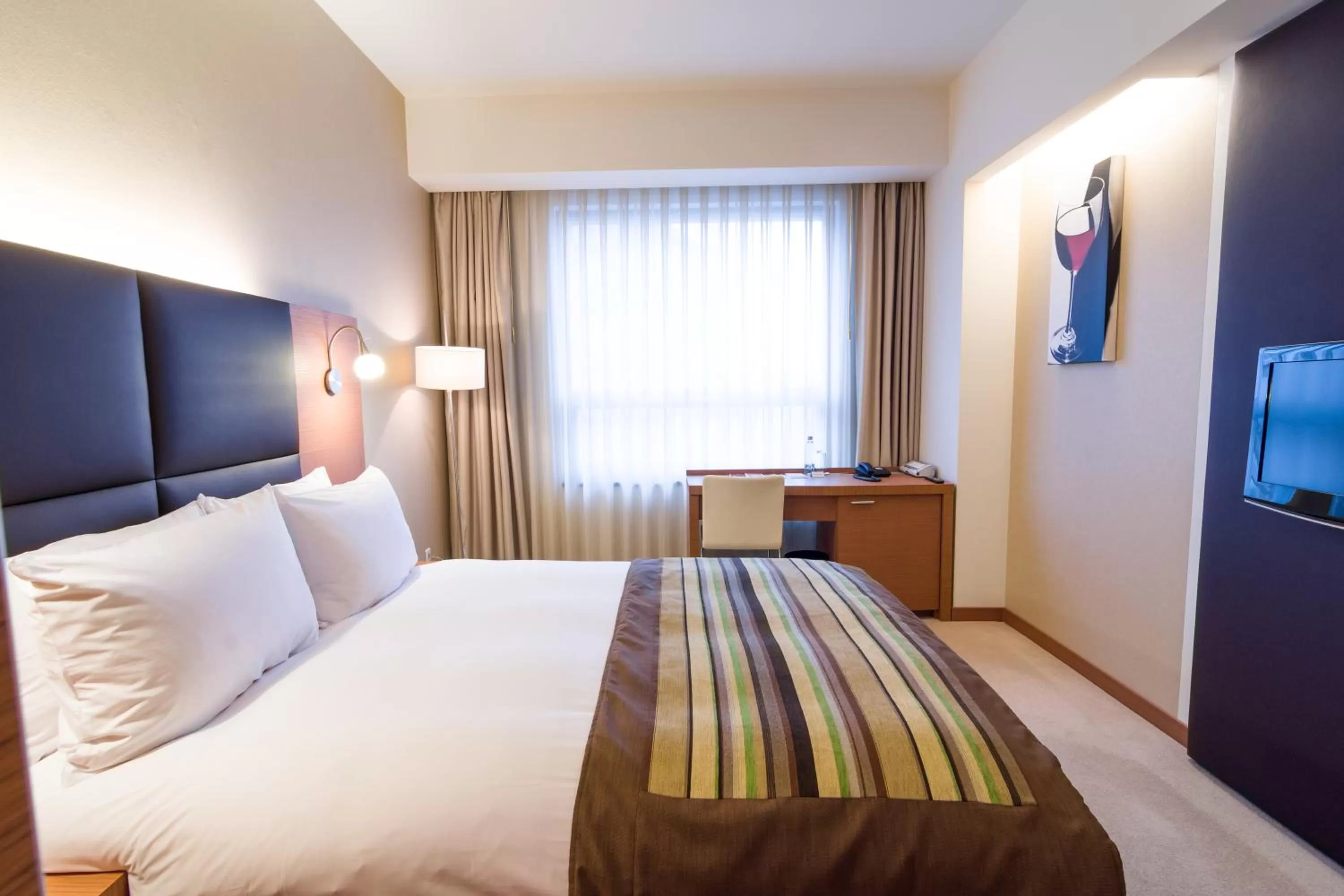 Bed in Ramada by Wyndham Oradea