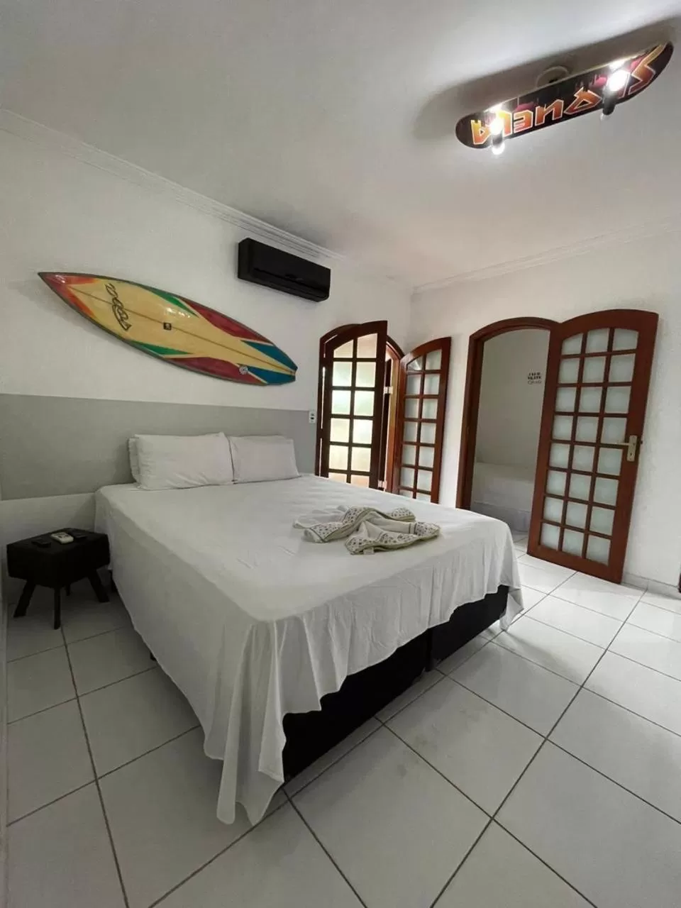 Bed in Pousada Praia do Tombo