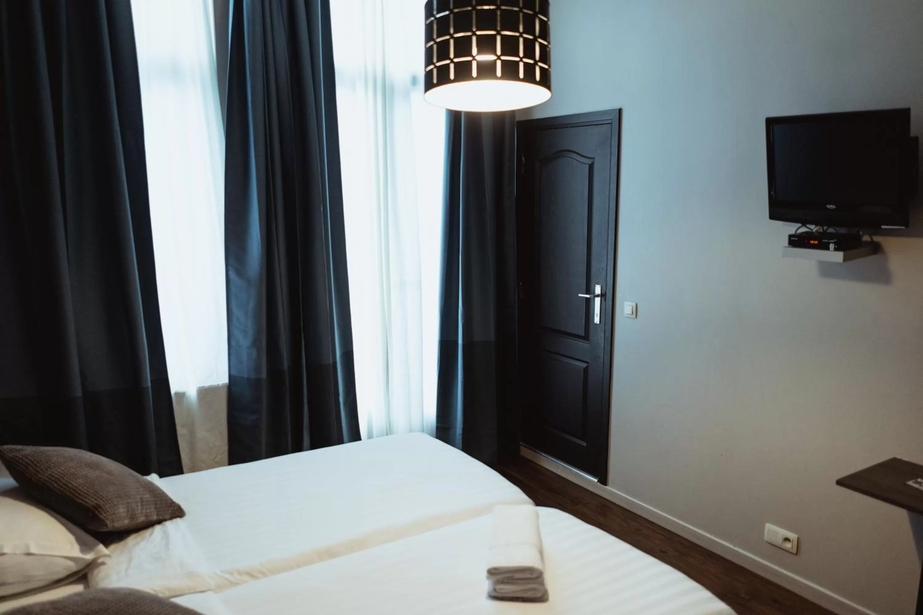 Bed in Hotel Le Centenaire Brussels Expo