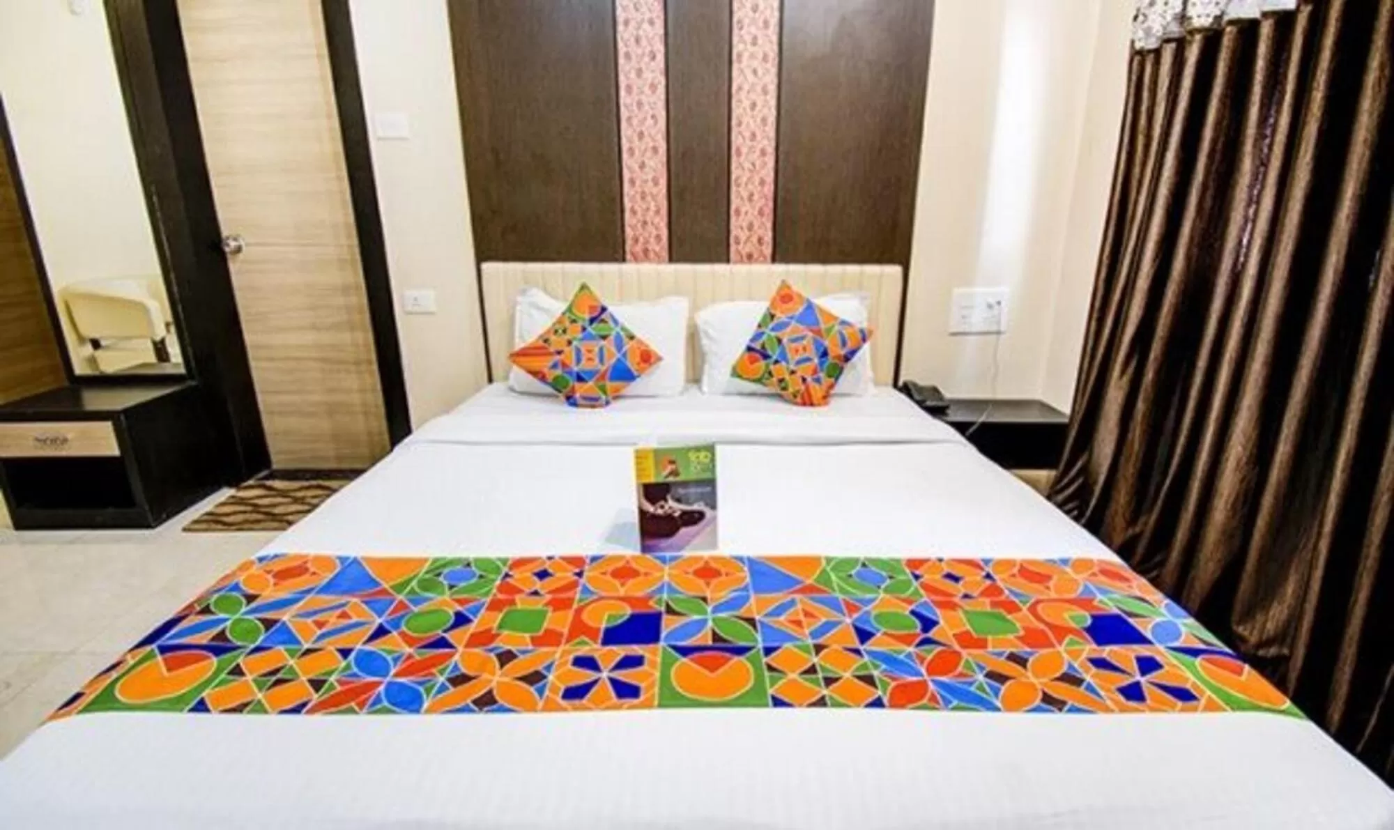 Bed in FabHotel Krishna Regency
