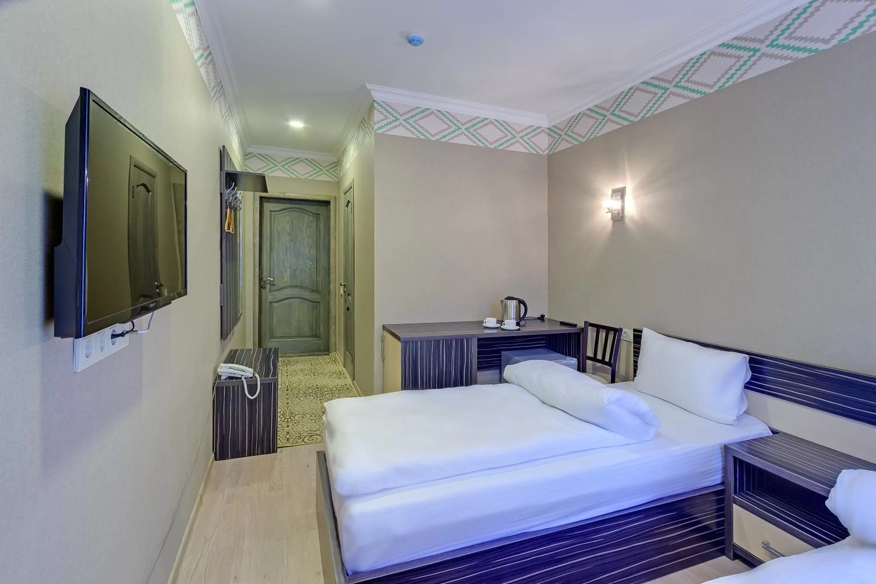 Decorative detail, Bed in Resident Hotel Almaty