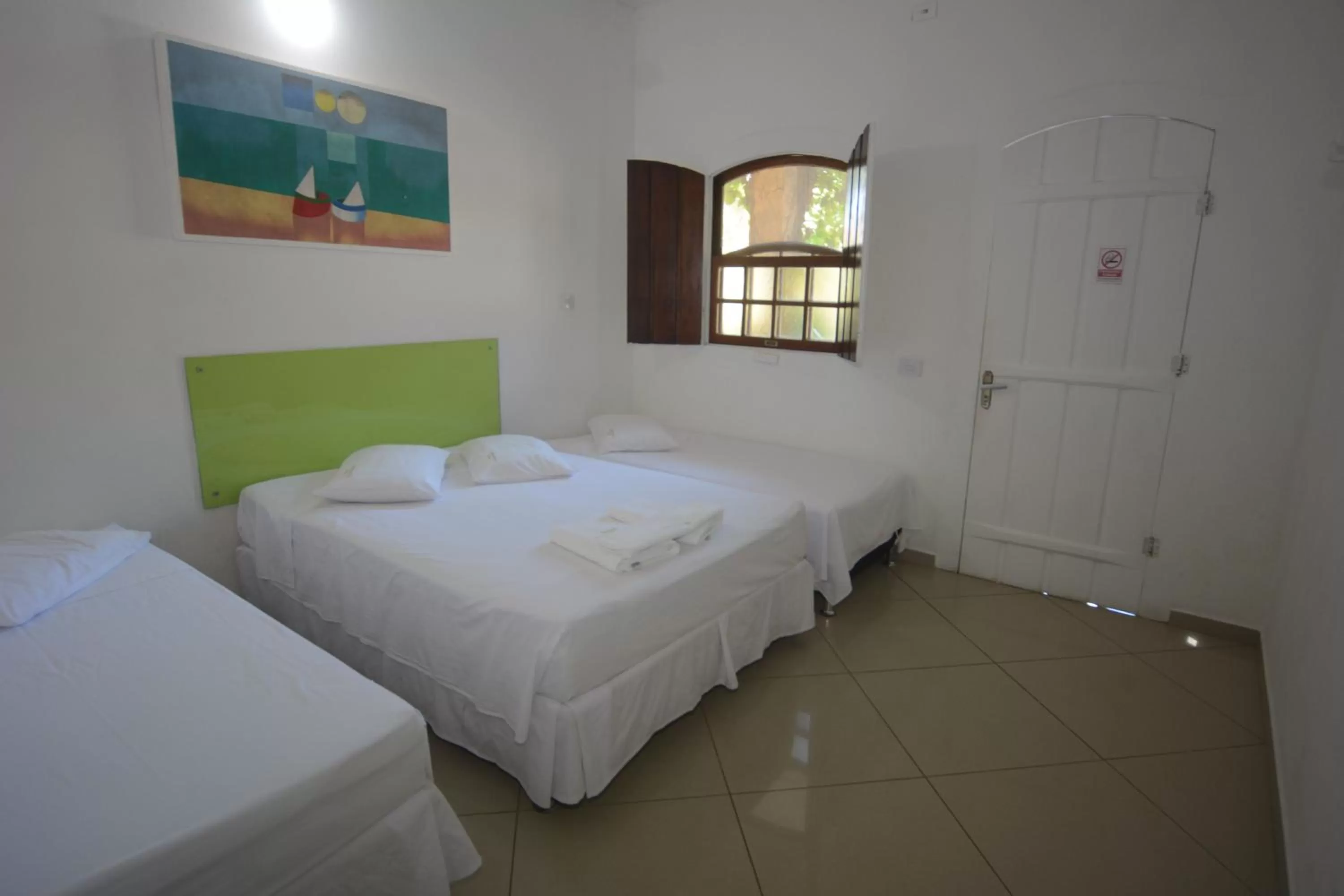 Photo of the whole room, Bed in Pousada Praia do Jabaquara