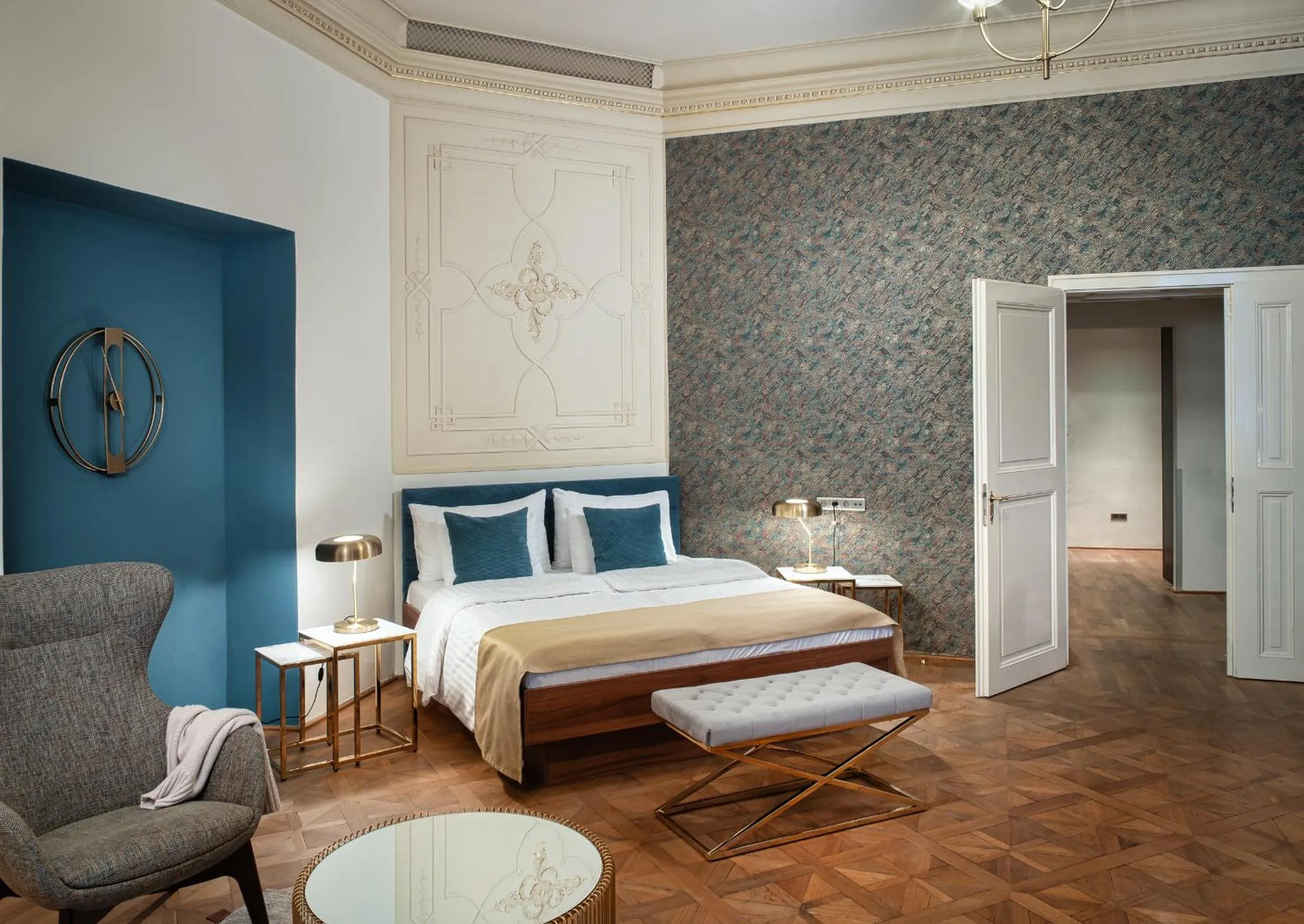 Bed in Golden Angel Suites by Adrez