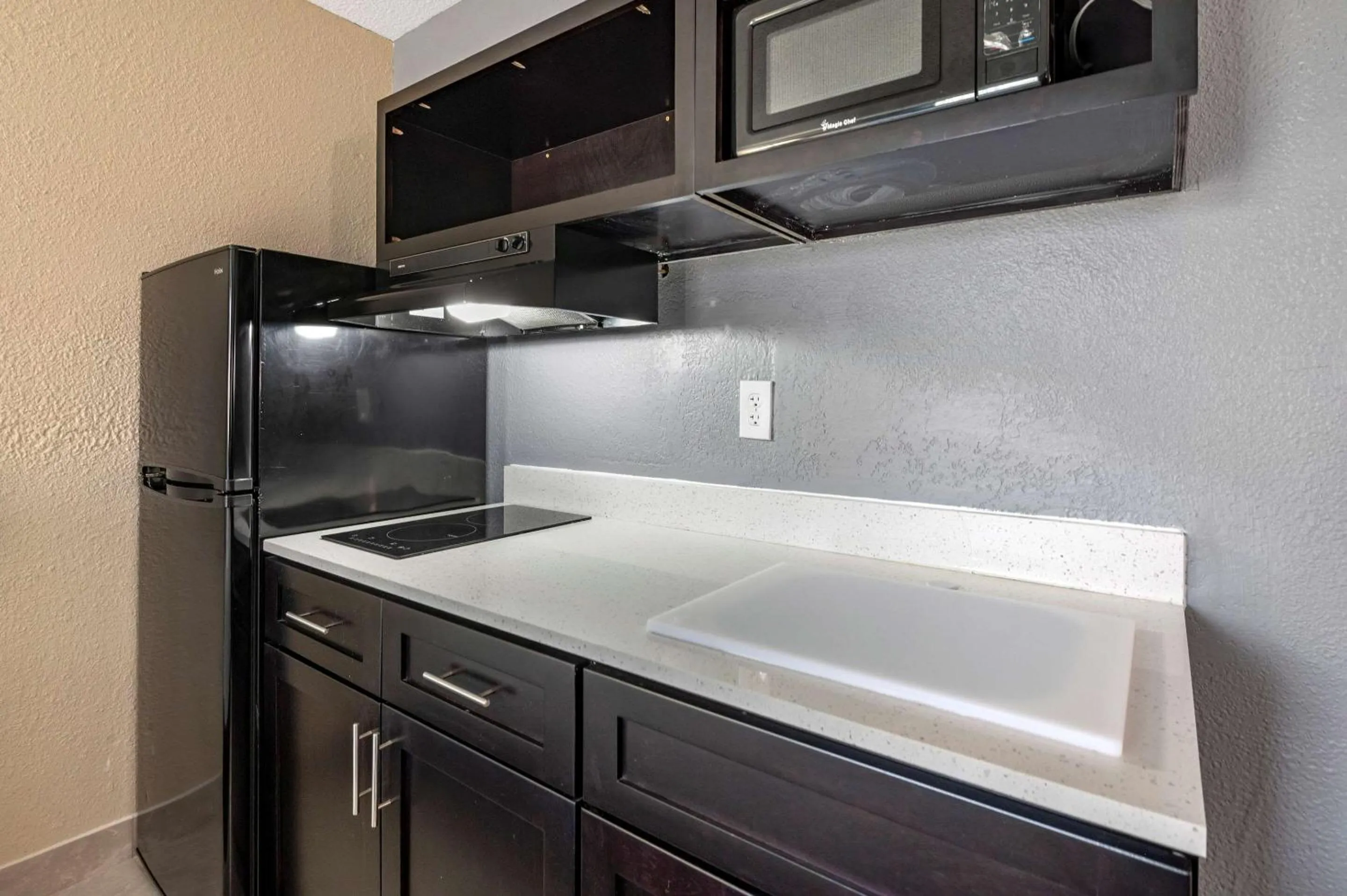 Bedroom in Suburban Studios Lafayette