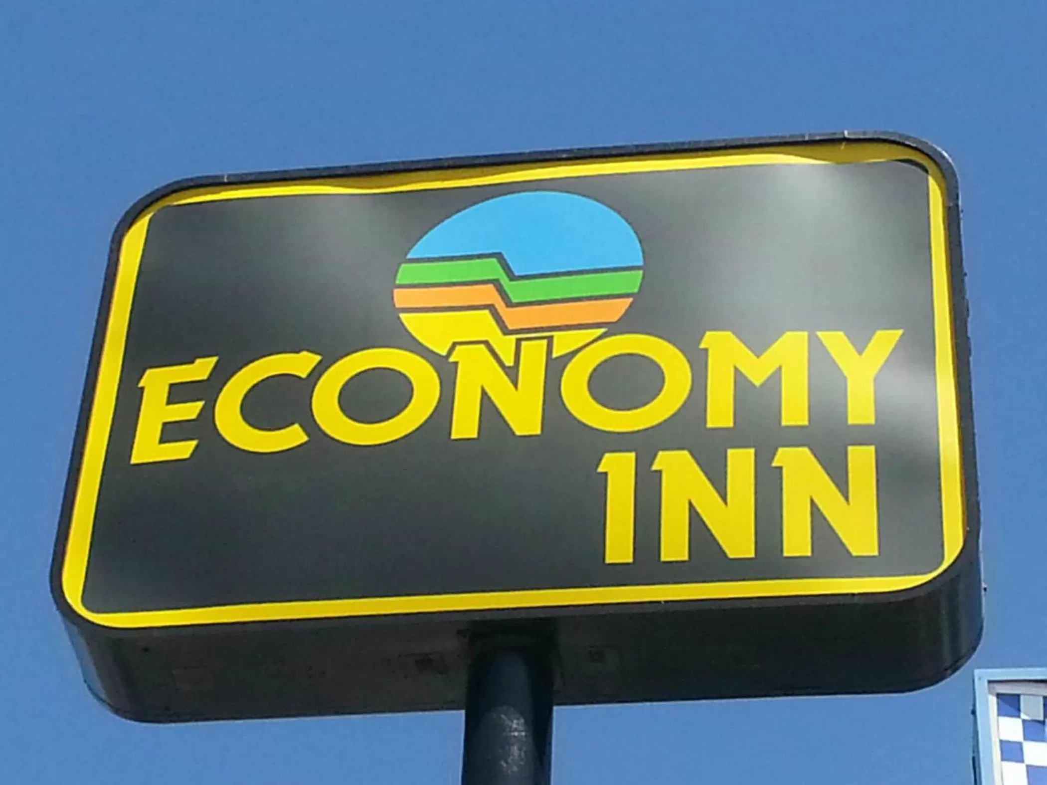 Property logo or sign in Economy Inn