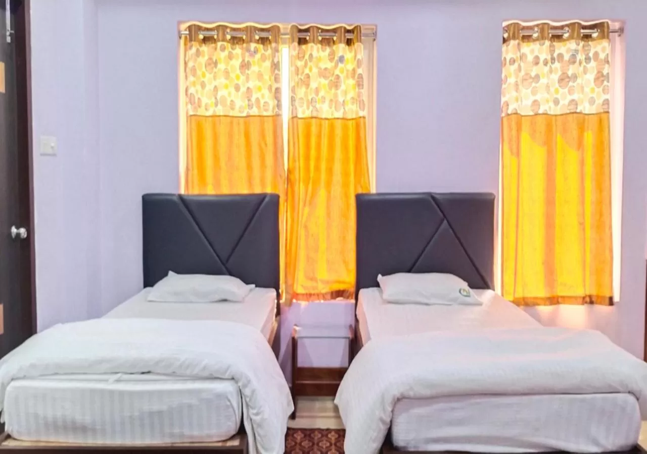 Bed in HOTEL PURI GREENS