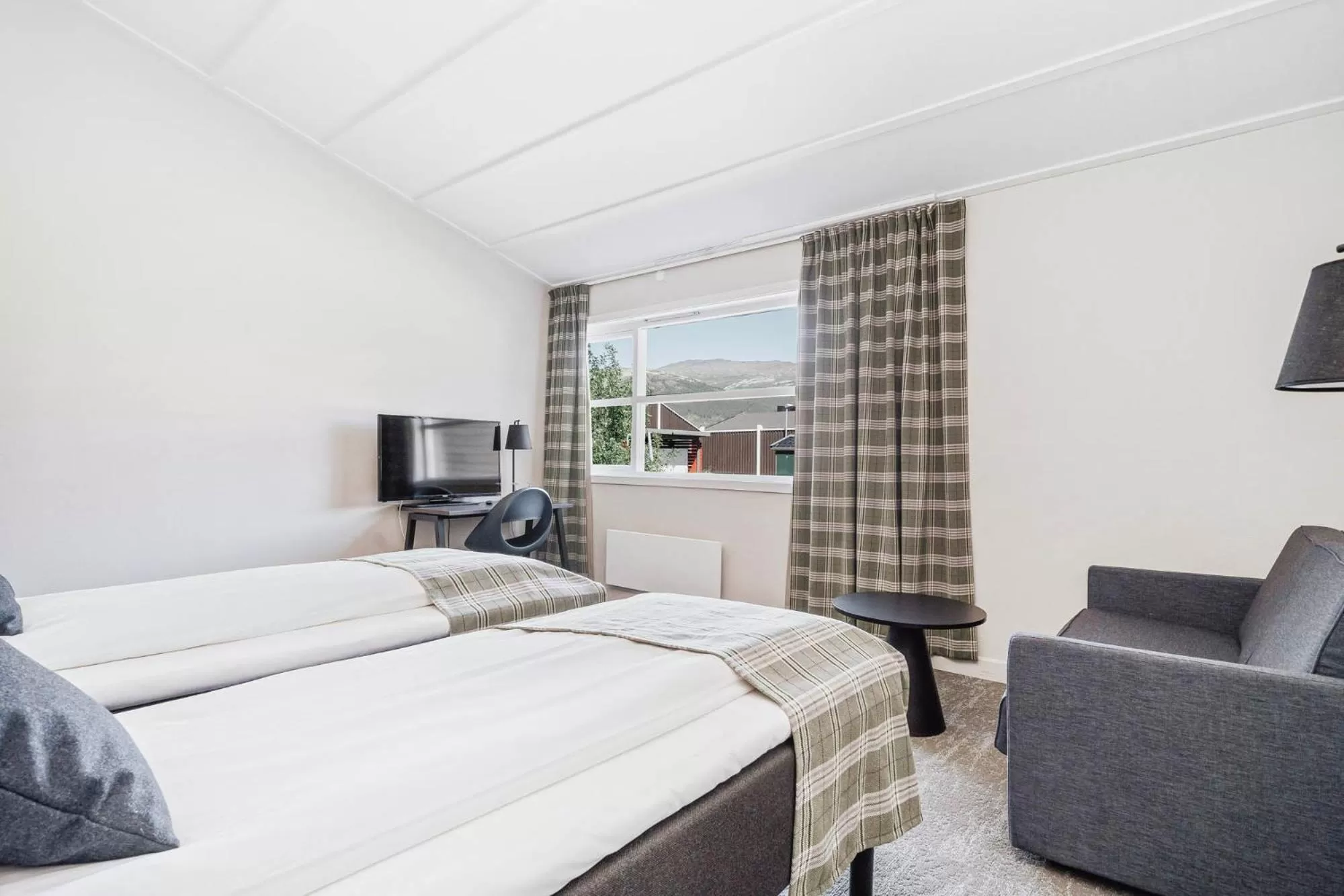 Bed in Frich's Hotell og Spiseri Alvdal