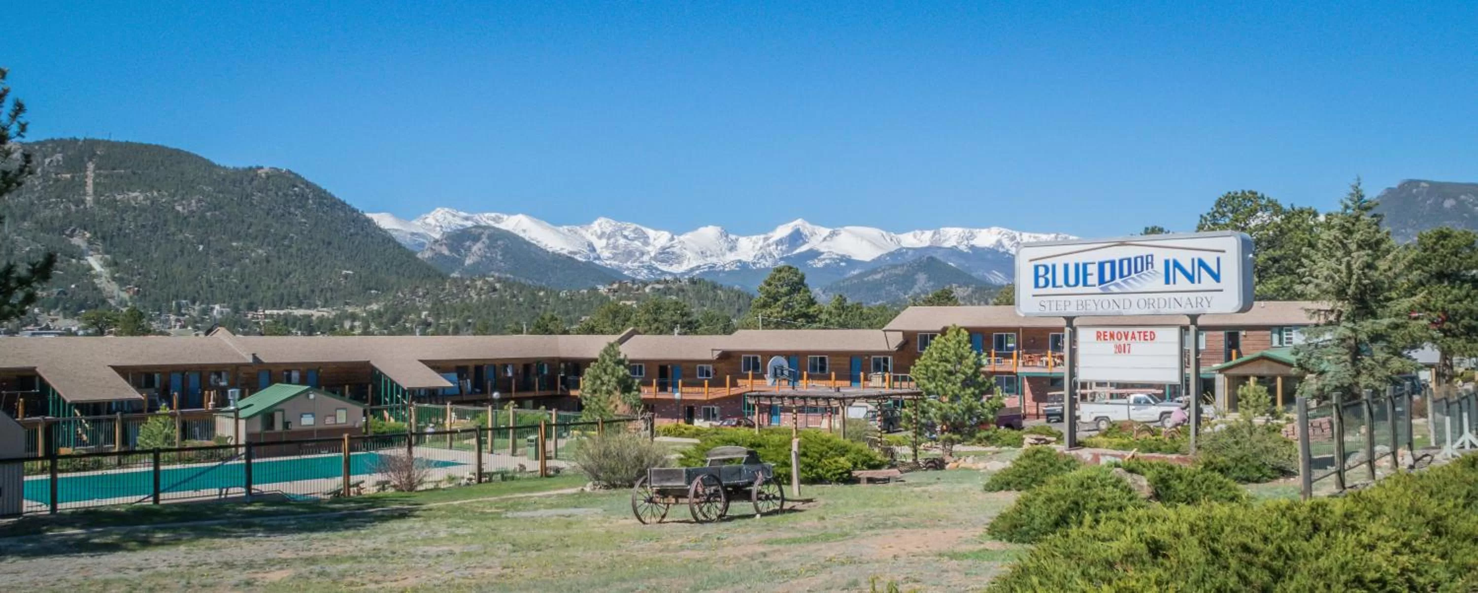 Property logo or sign in Blue Door Inn