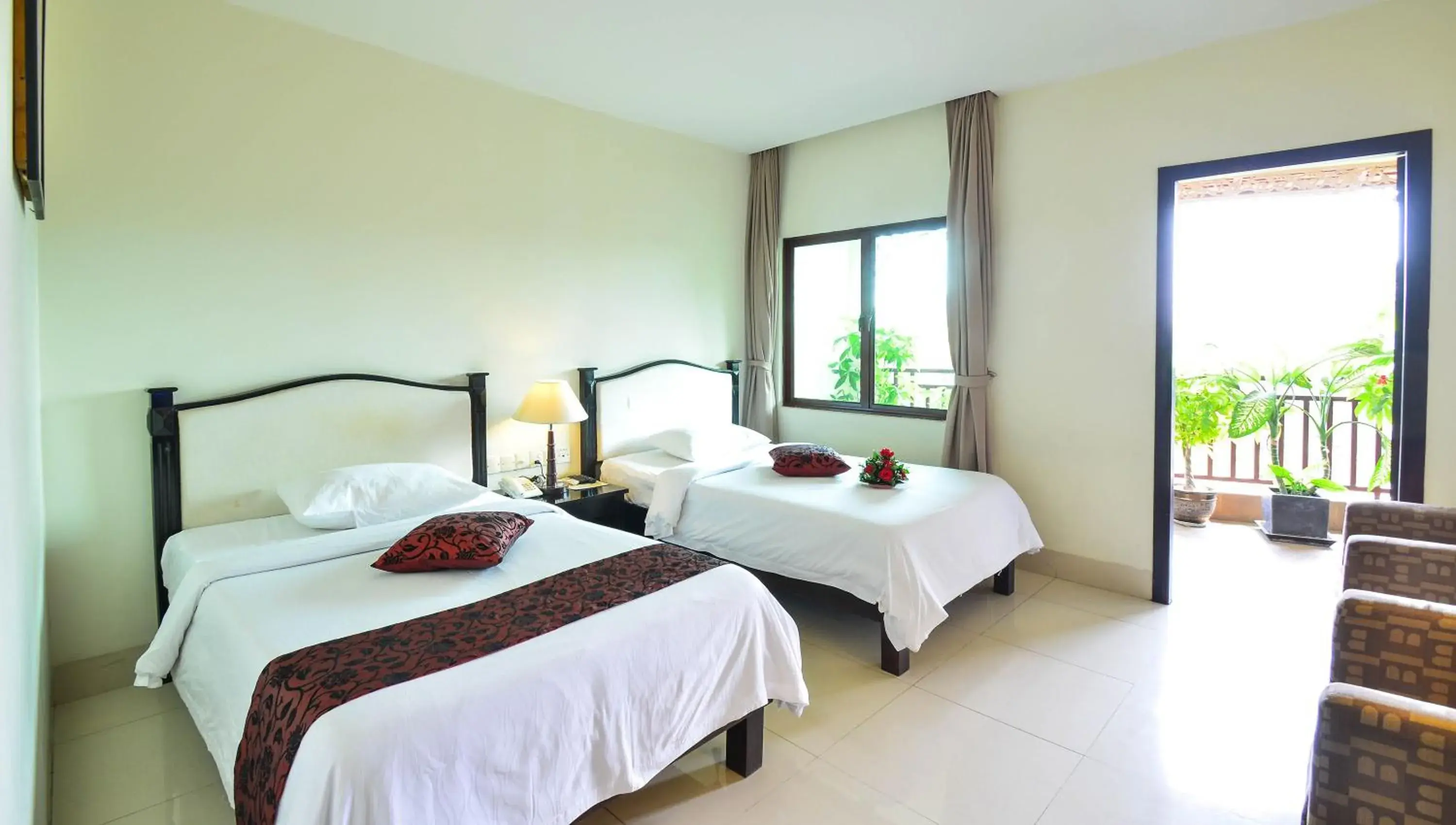 Deluxe Twin – Balcony in Almond Hotel Sothearos Deluxe Twin – Balcony in Almond Hotel Sothearos