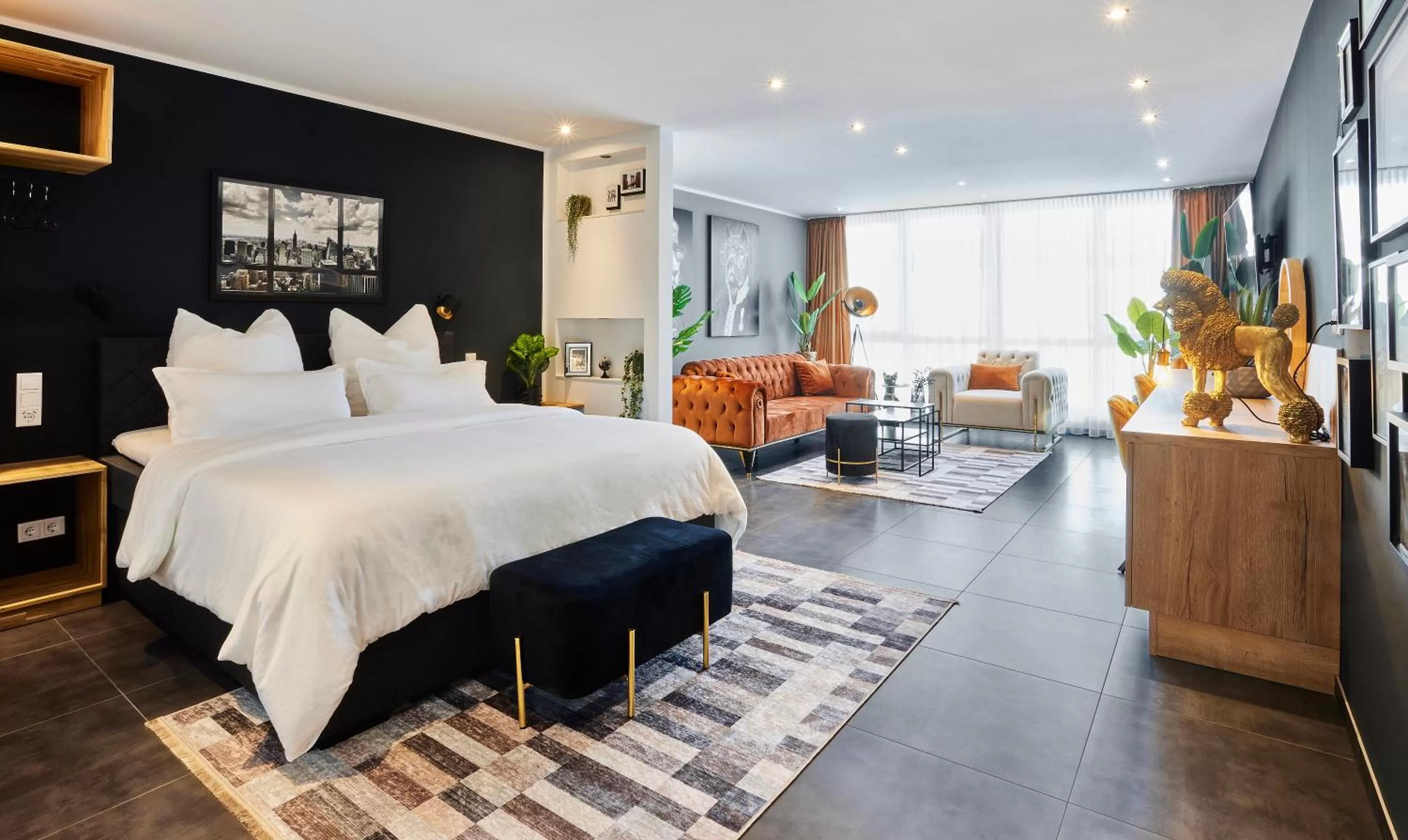 Bed in MARRAM Suitehotel